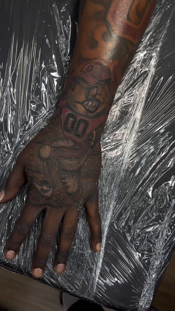 Realism tattoo on the forearm by Mike Tatts