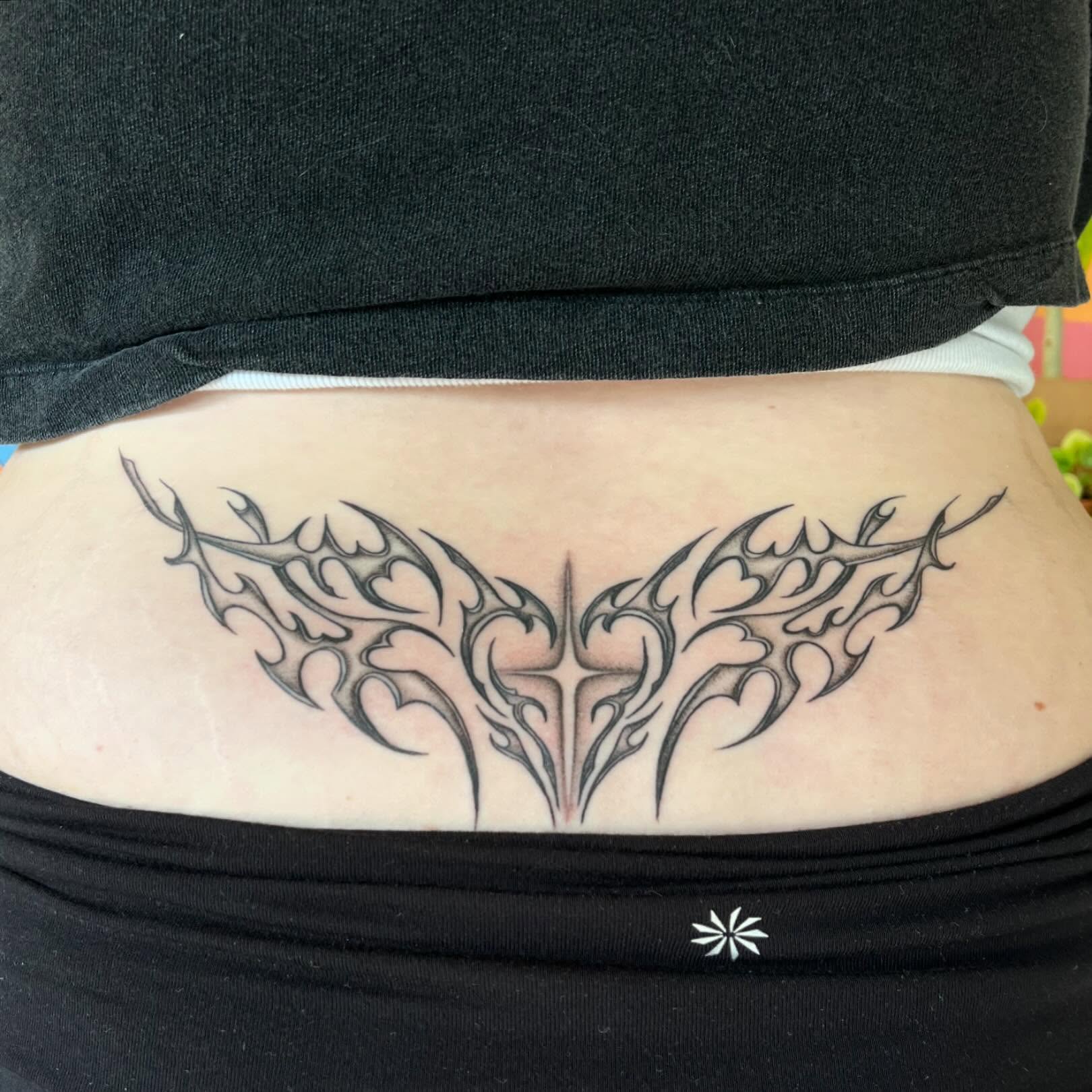 Tribal wings tribal tattoo on the torso by 🌼DaisyDaiz🕸️
