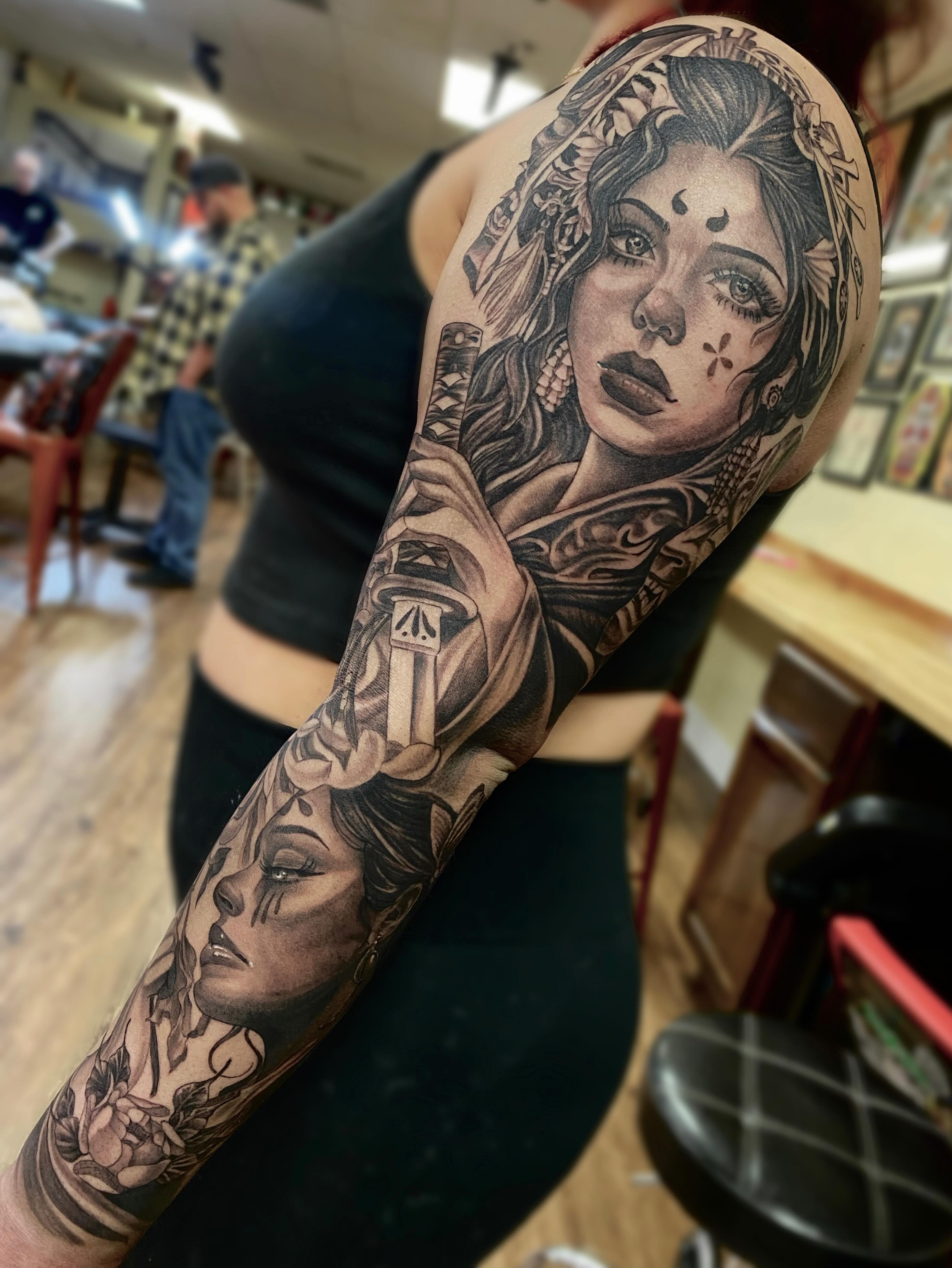 Woman with sword realism tattoo on the forearm by Mathilda Quynh