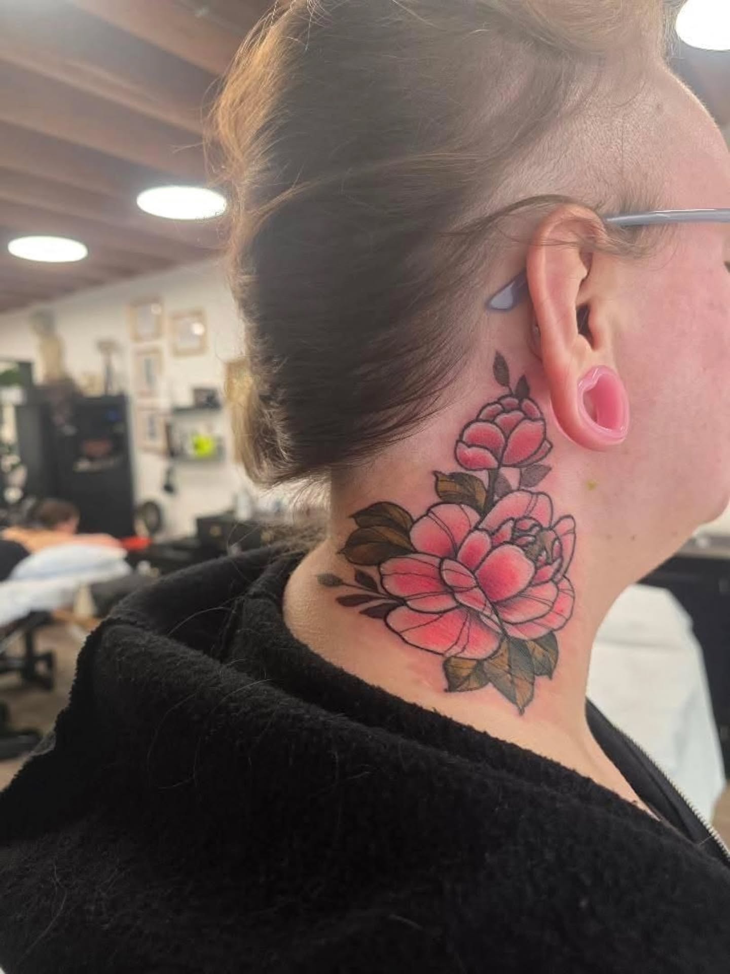 Floral American traditional tattoo on the neck by mikayla