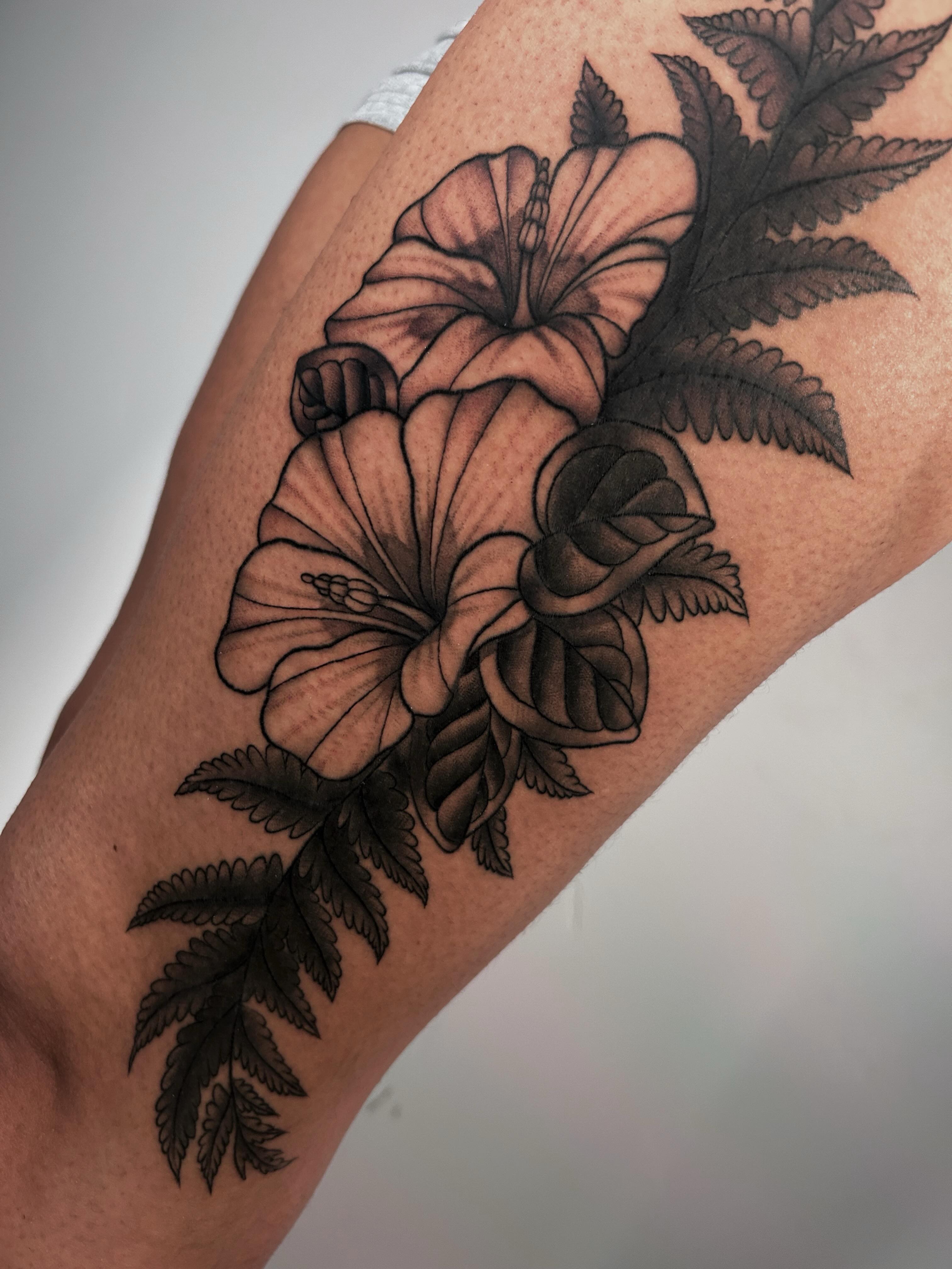 Hibiscus flowers black and grey tattoo on the forearm by Salt Lake City tattoo artist