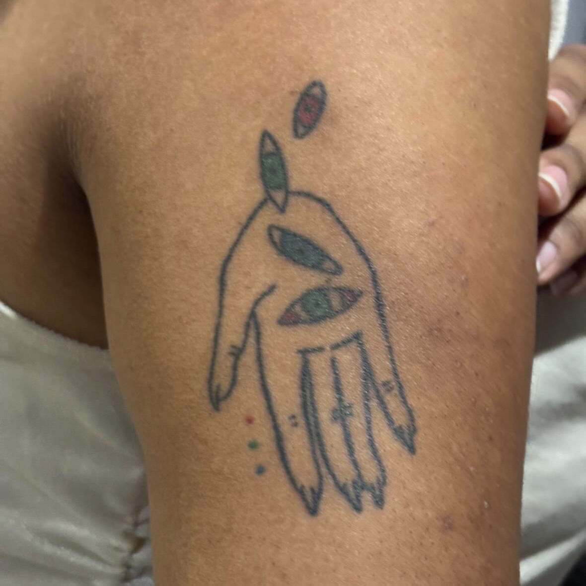 Hands dotwork tattoo on the upper arm by ☠️mikauley☠️
