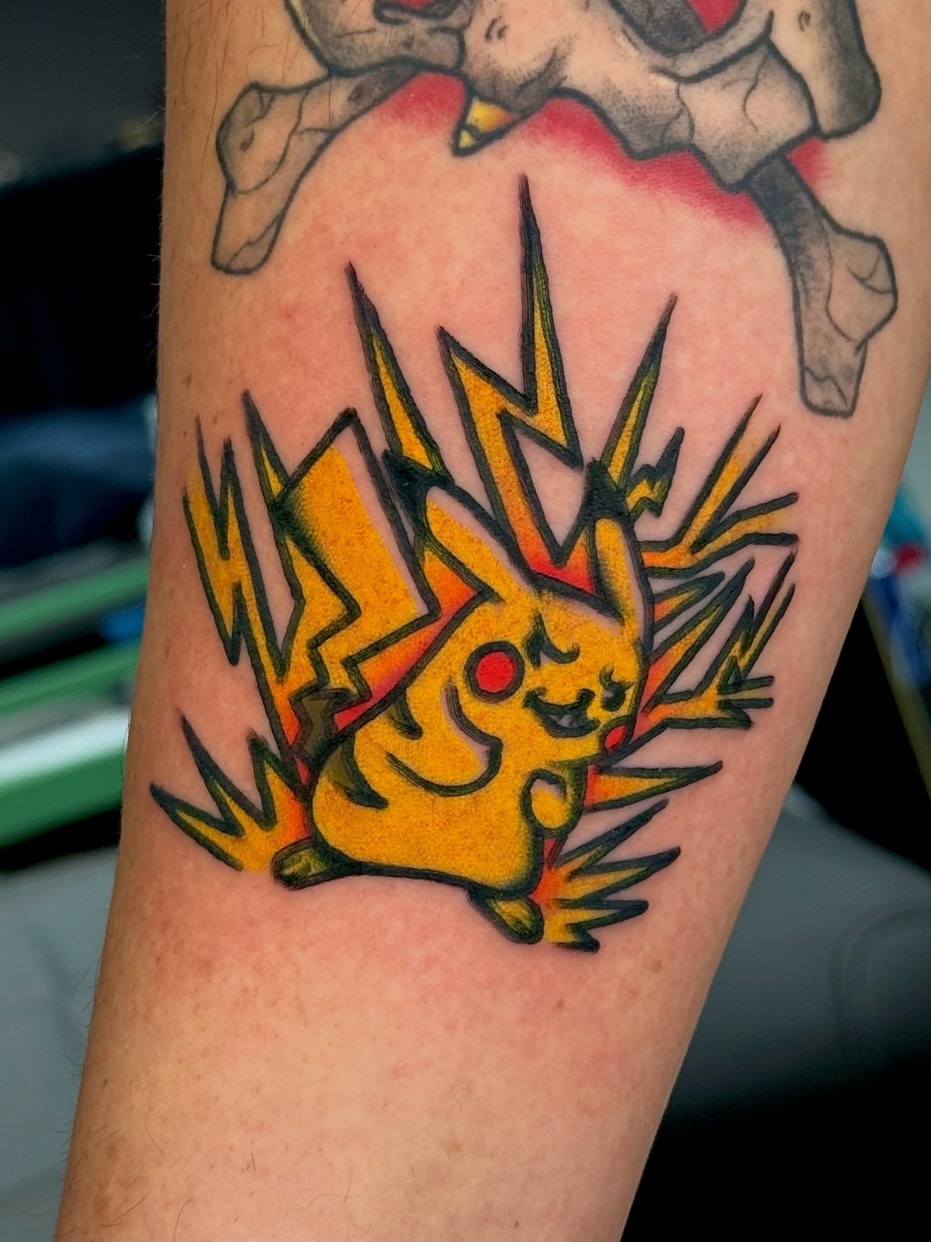 Electric-type Pokémon American traditional tattoo on the forearm by Tattooer Sancho 🇰🇷🇨🇦