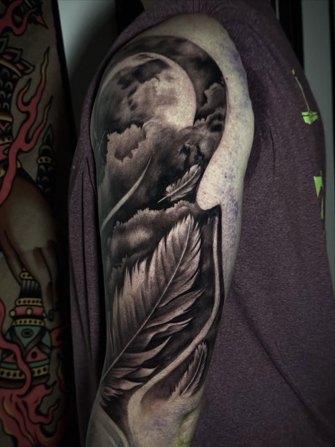 Moon and feathers realism tattoo on the forearm by Tony Garcia
