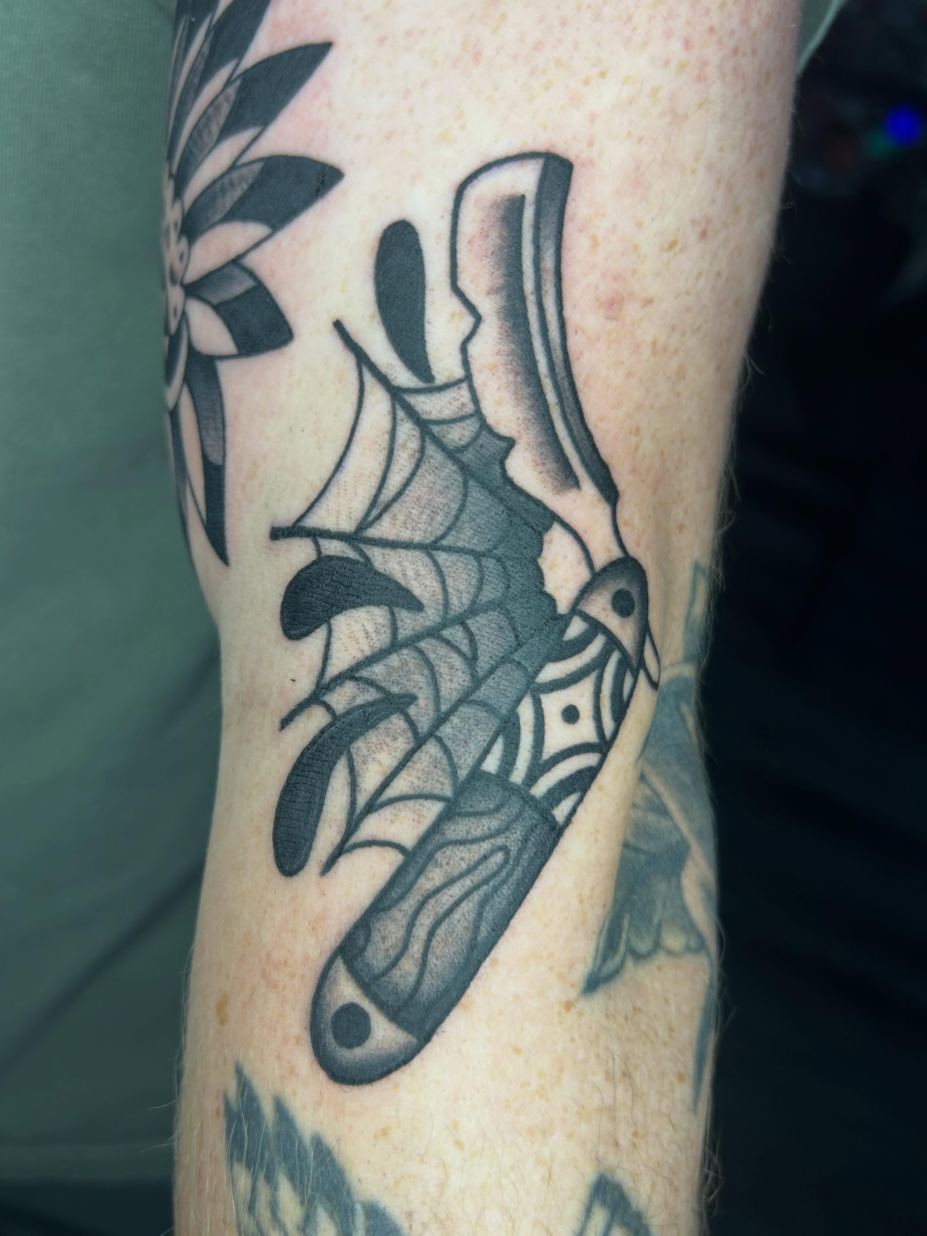 Bat American traditional tattoo on the forearm by Zach Andrews