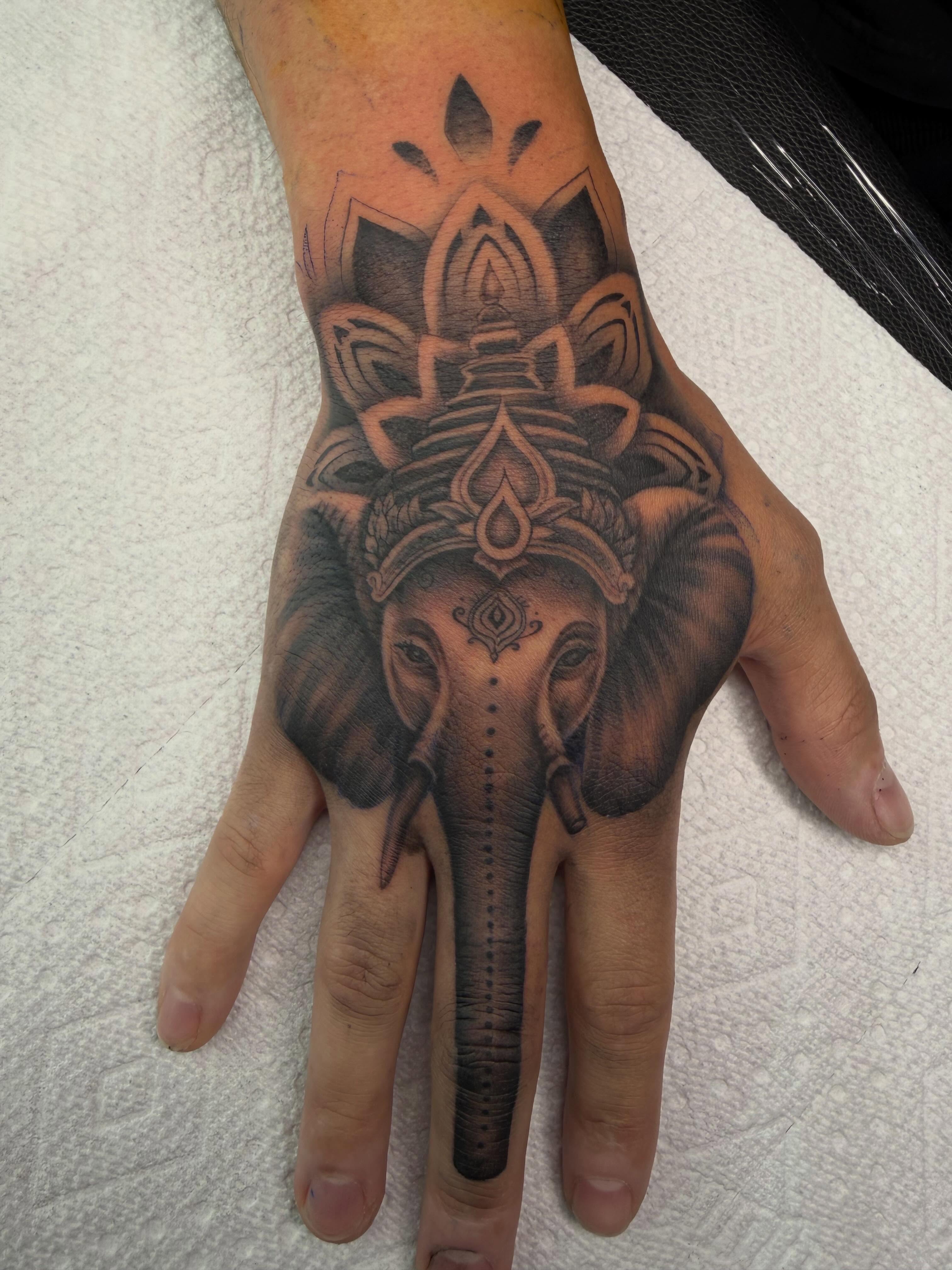 Elephant head realism tattoo on the hand by Denver Tattoo Artist