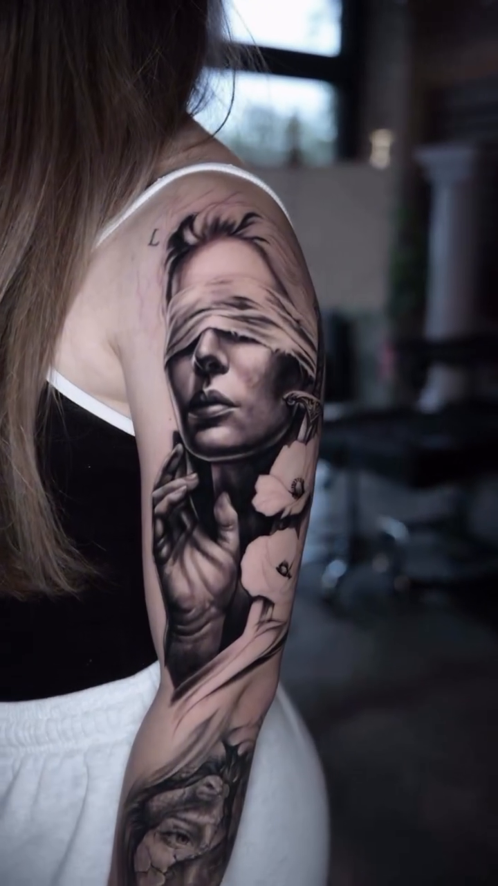 Blindfolded woman realism tattoo by Gregorio Devera