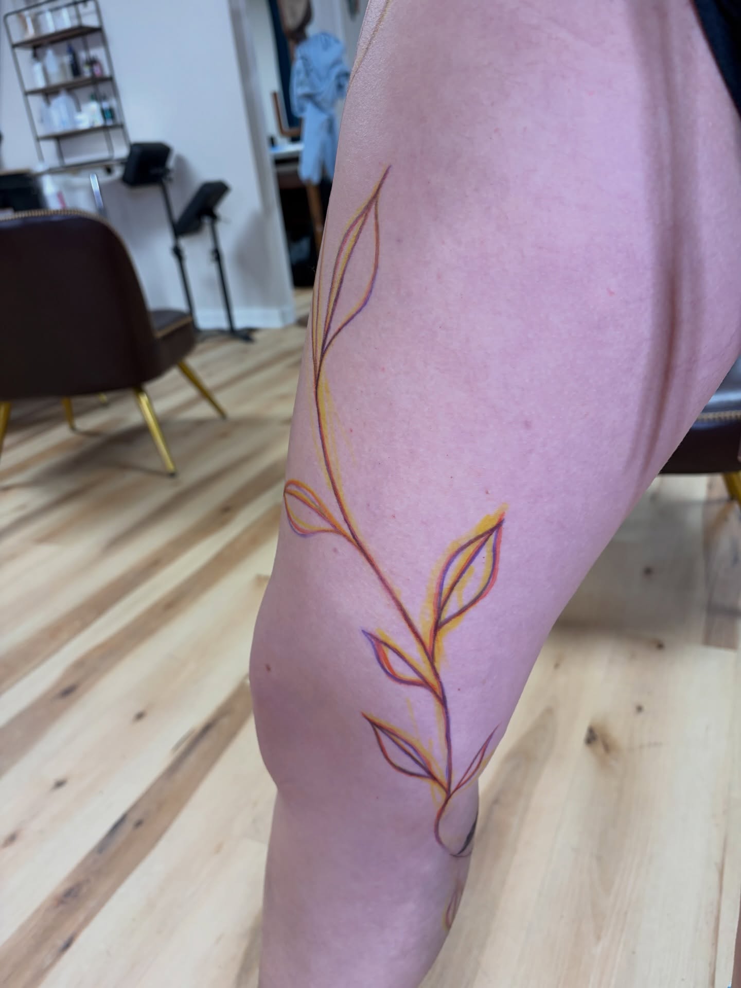 Branch with leaves fine line tattoo on the forearm by Francesca Siwa