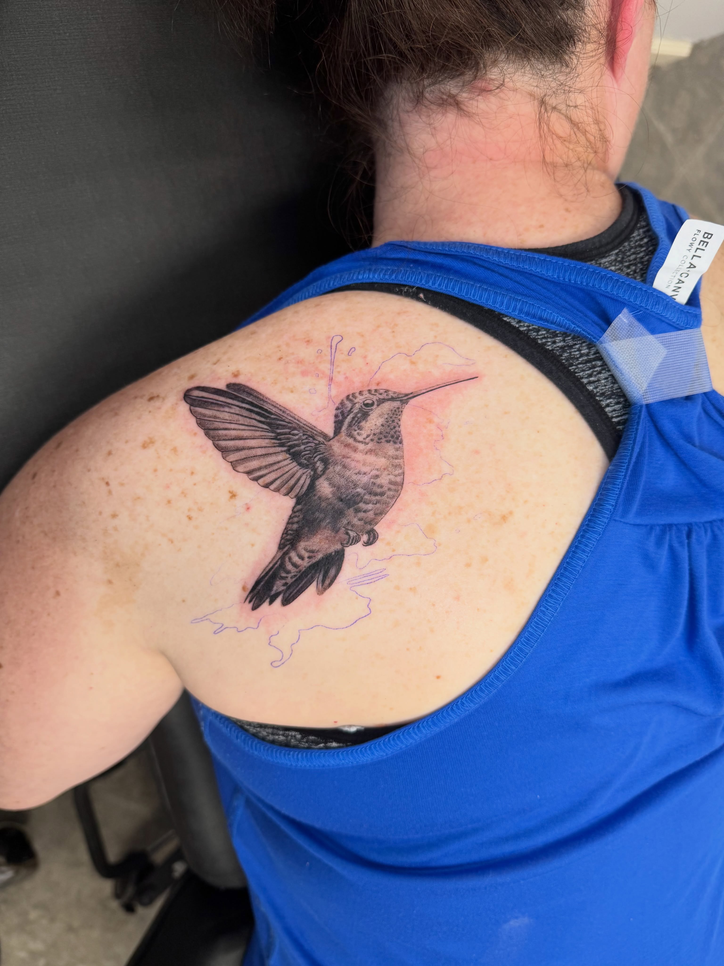 Hummingbird realism tattoo on the shoulder by Juan Guzman