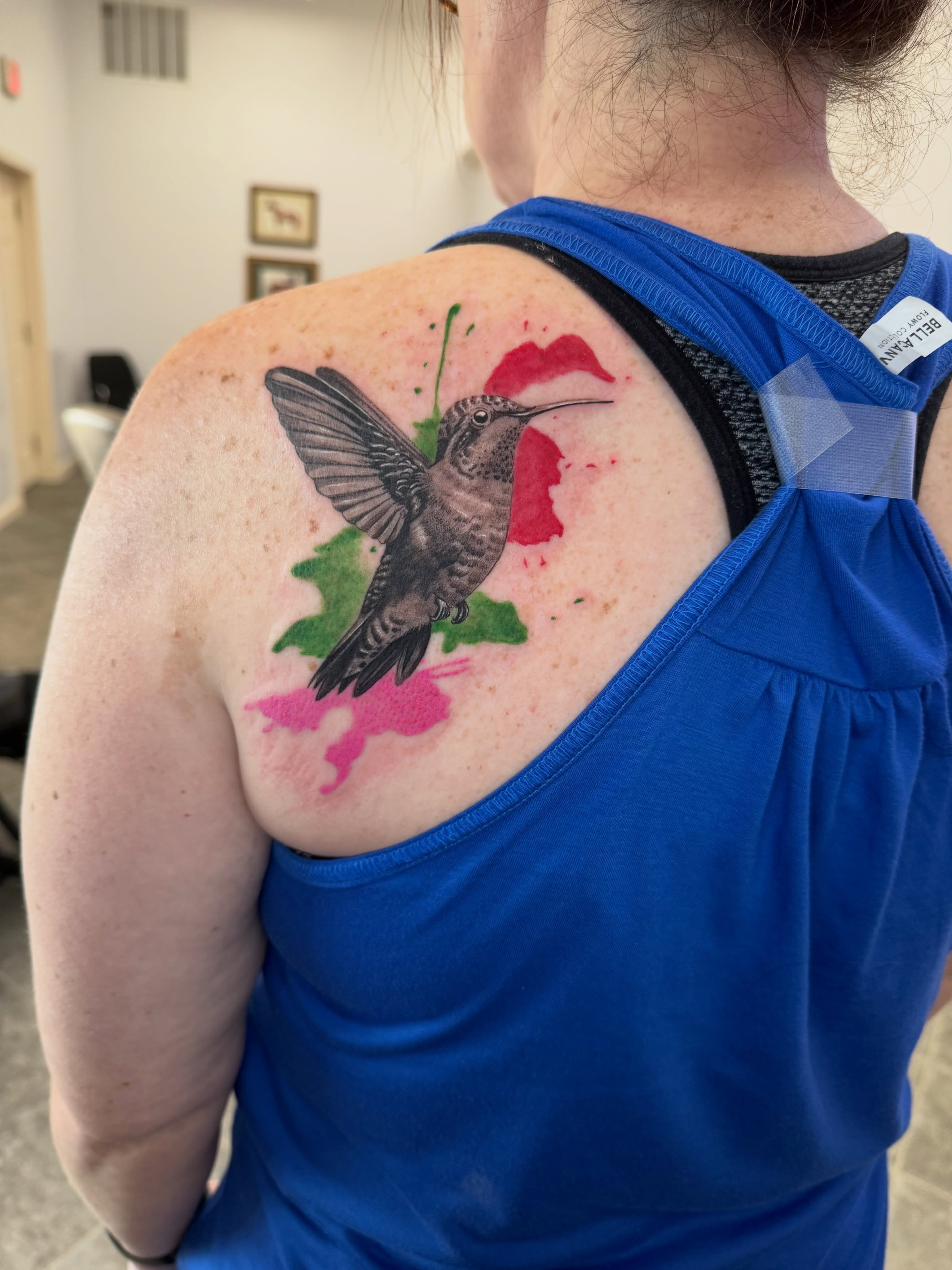 Hummingbird realism tattoo on the shoulder by Juan Guzman