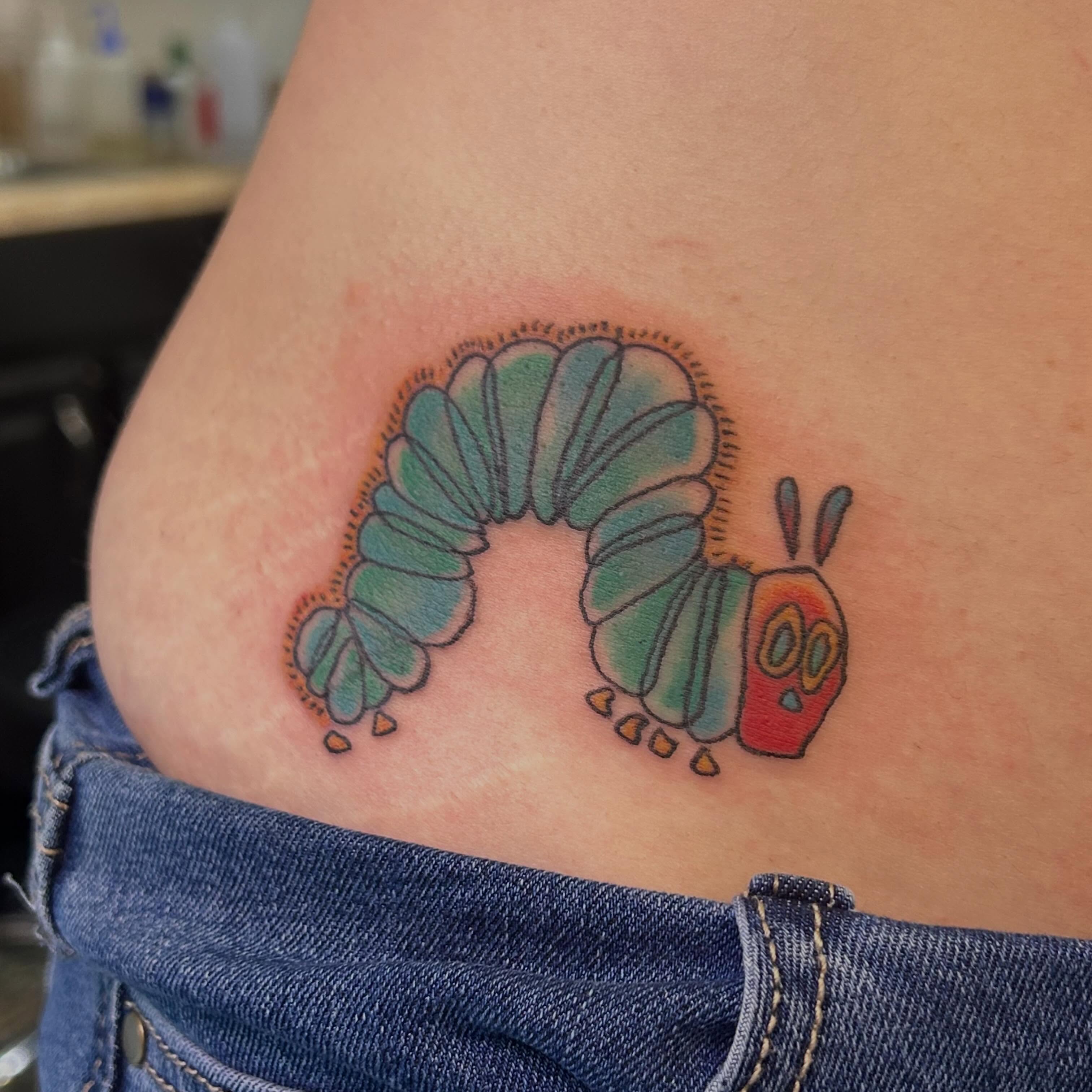 Worm new school tattoo on the thigh by Norfolk Tattooer, Norfolk, Virginia