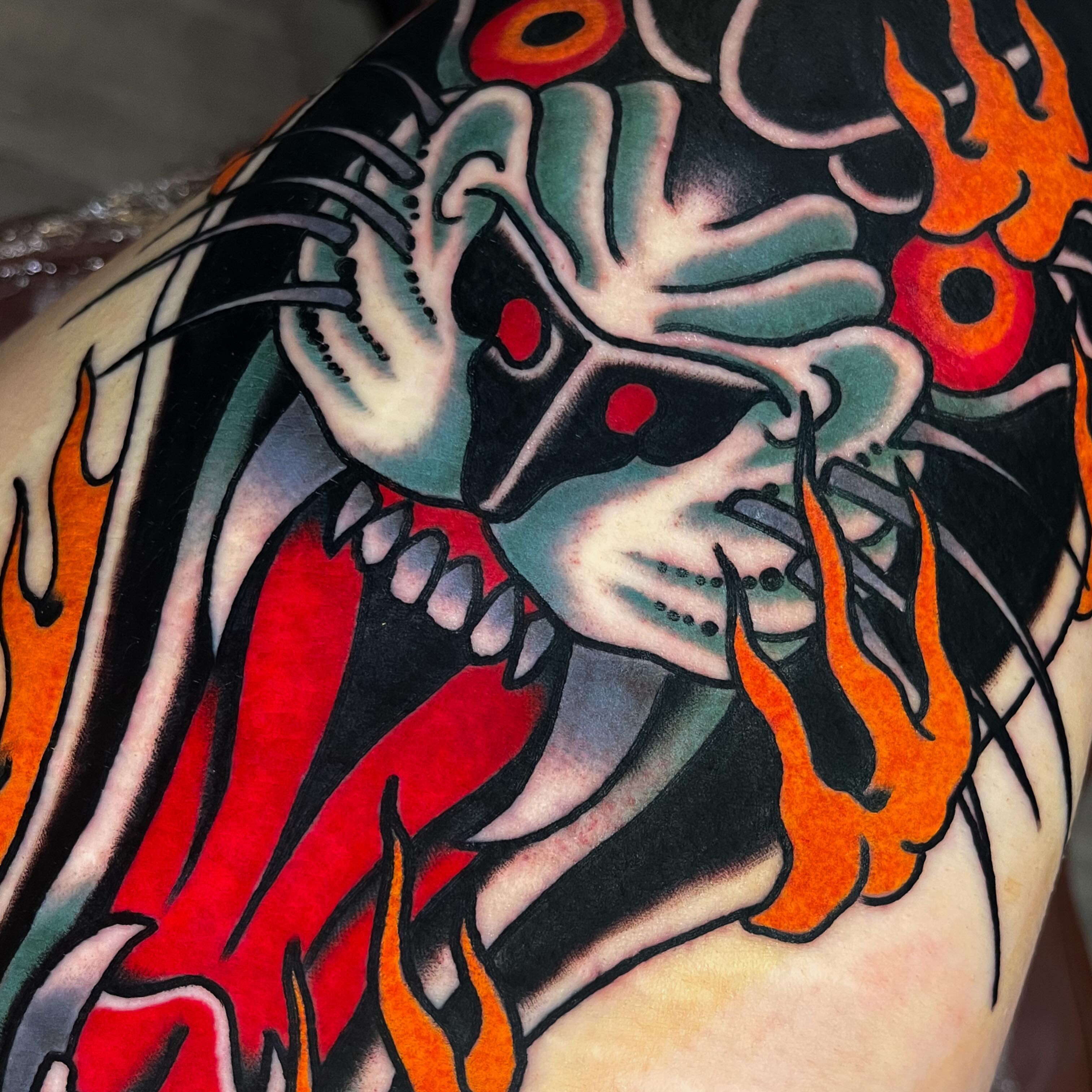 Demon American traditional tattoo on the upper arm by Sky G, Colorado Springs, Colorado