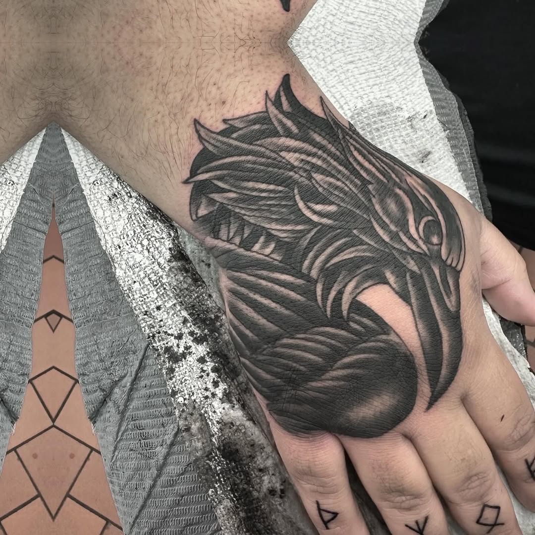 Eagle head realism tattoo on the forearm by Murl Dietrich