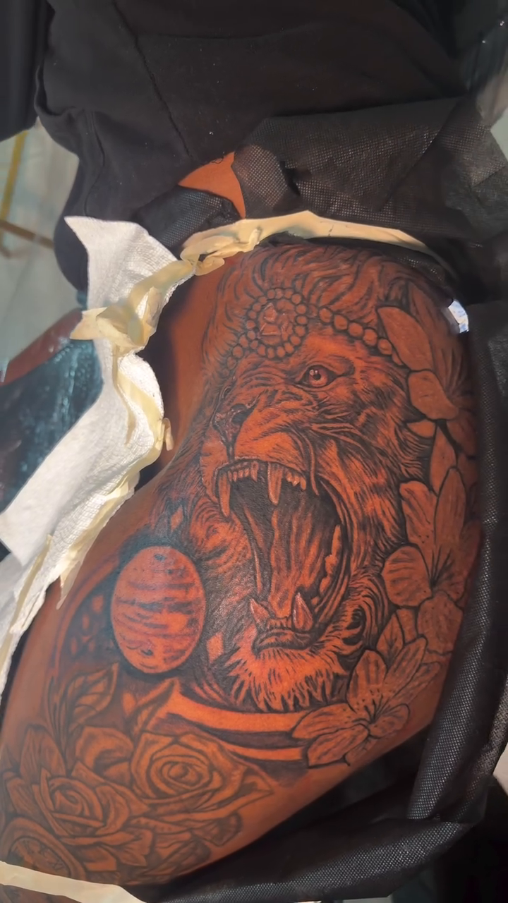 Lion with roses and planets realism tattoo by Justin custard Tattoo💉Artist 🎨Painter
