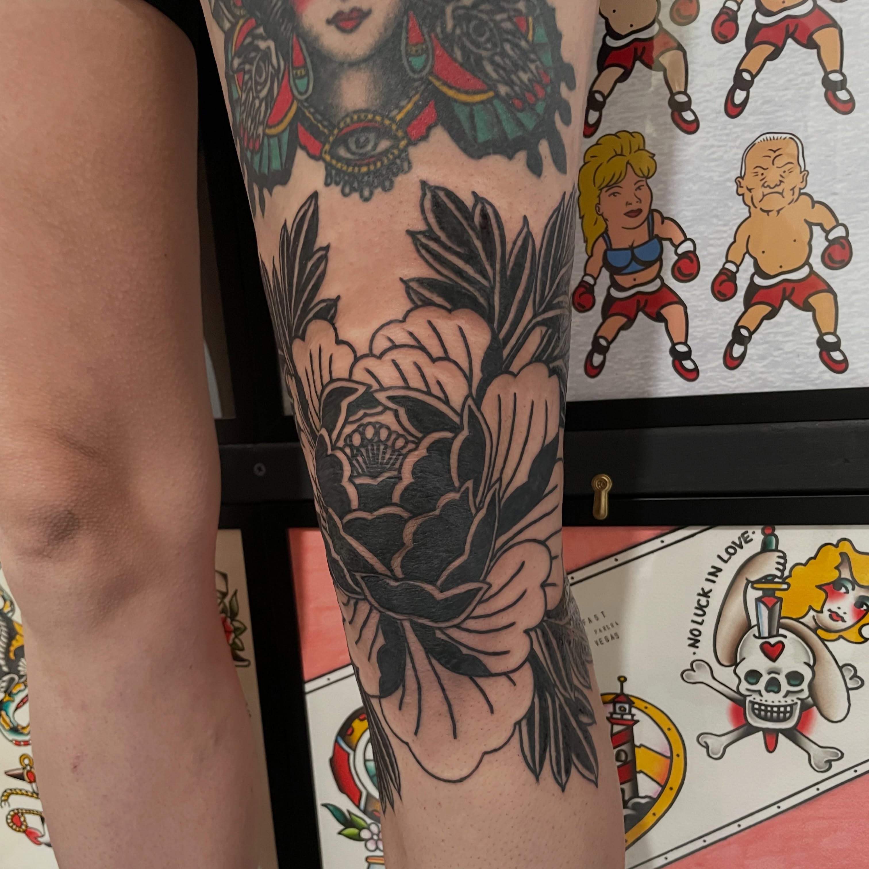 Peony flower American traditional tattoo on the forearm by Greg De Hoot, Youngsville, North Carolina
