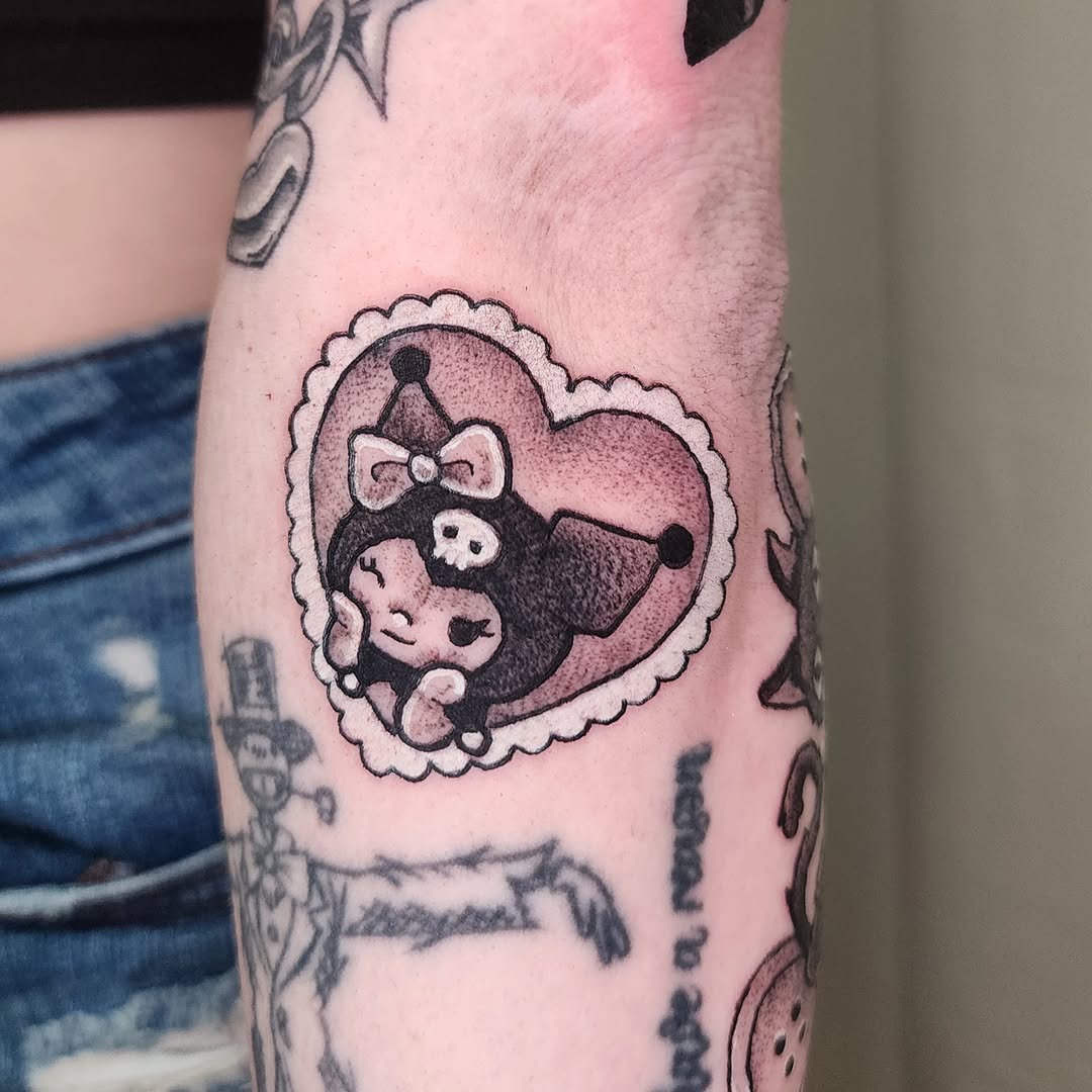 Jester character dotwork tattoo on the forearm by Lindsey Andrew, Englewood, Colorado