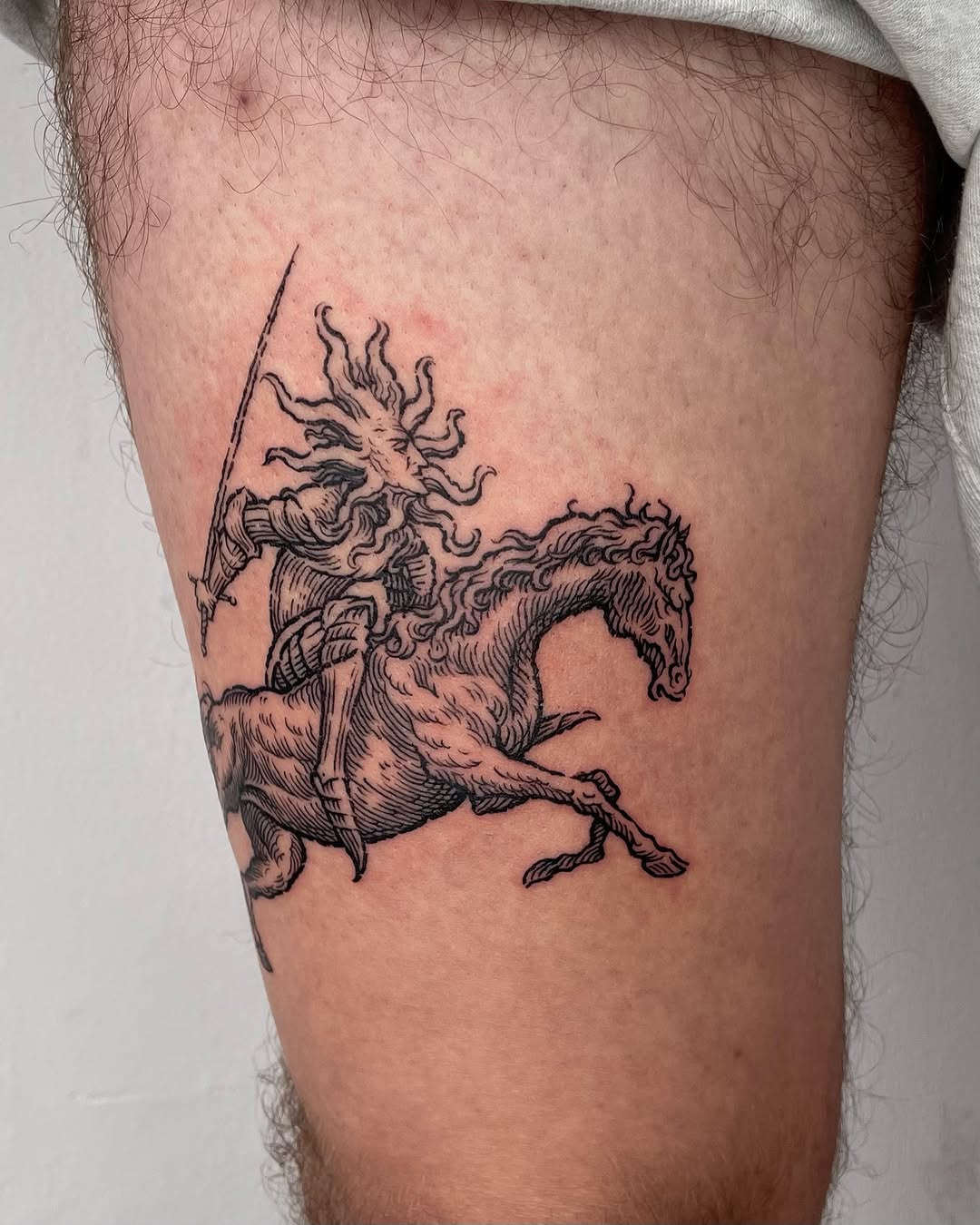 Dark art tattoo on the thigh by Anh Đan