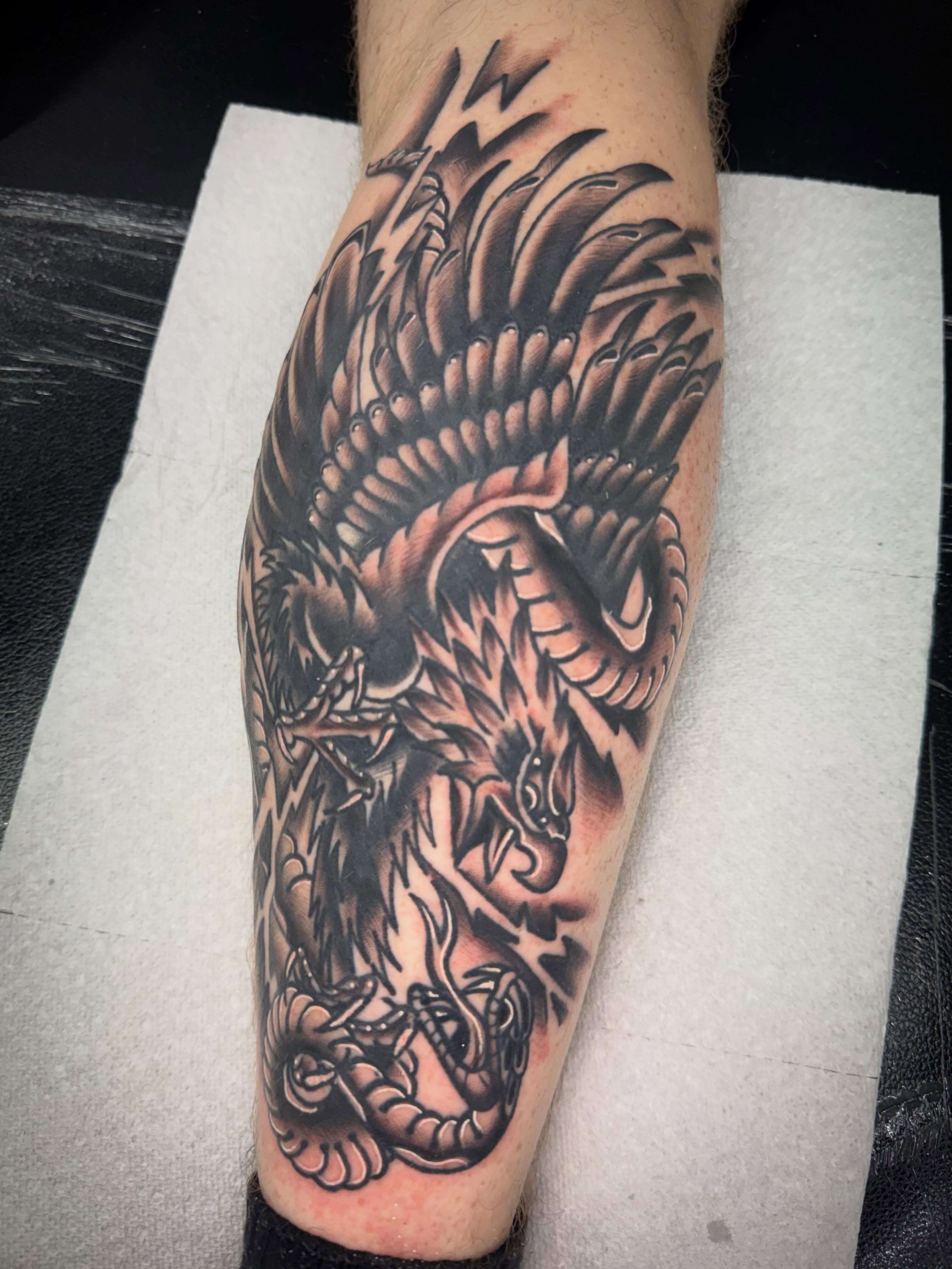 Dragon realism tattoo on the forearm by Jake Horstman, Dayton, Ohio