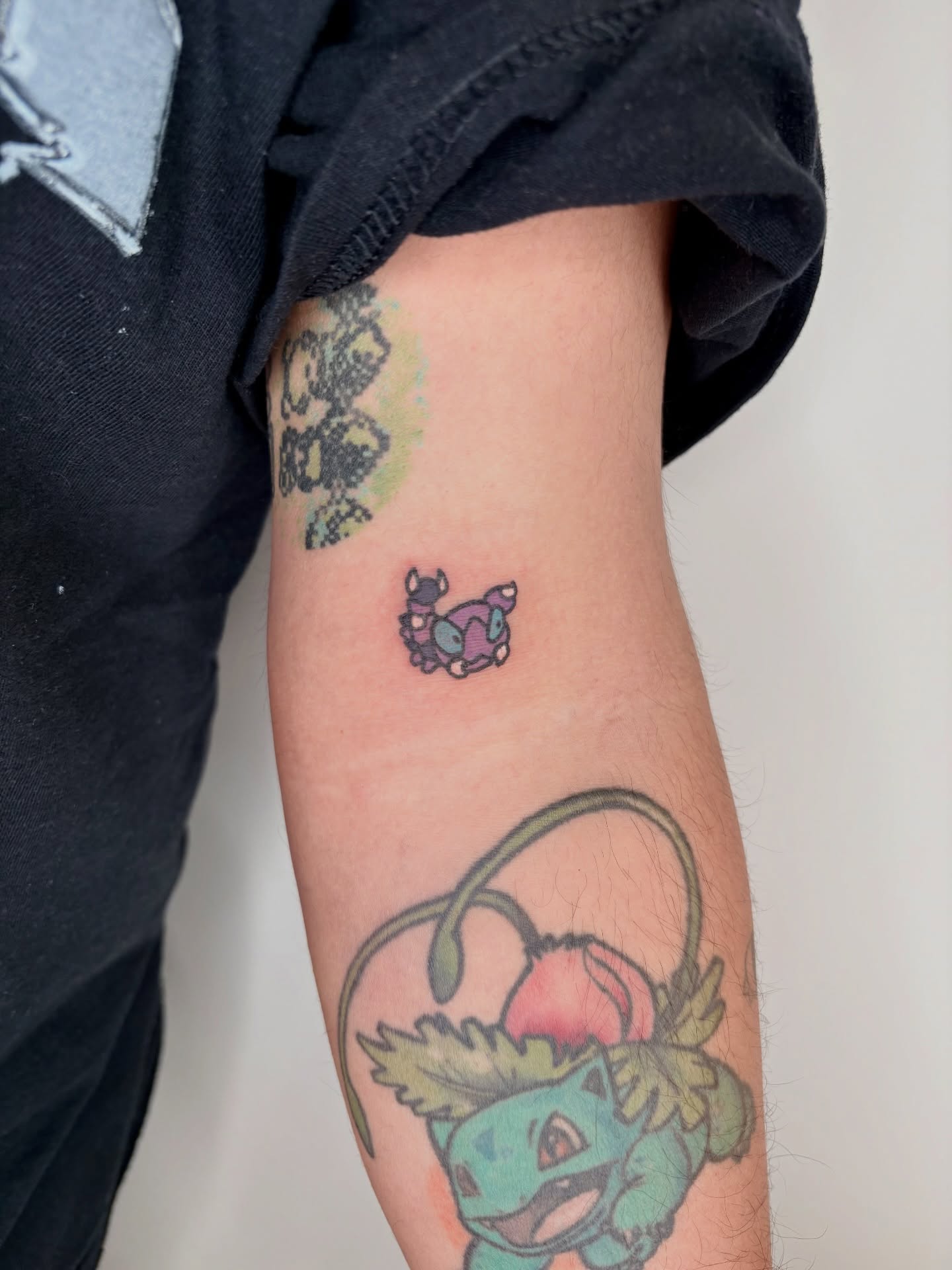 Bulbasaur new school tattoo on the forearm by Rami, Maden🇰🇷