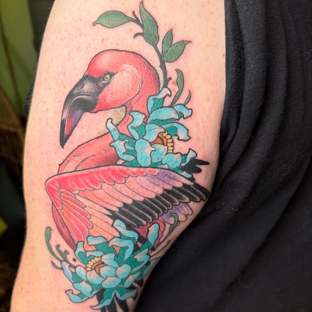 Flamingo and flowers new school tattoo on the forearm by Alex