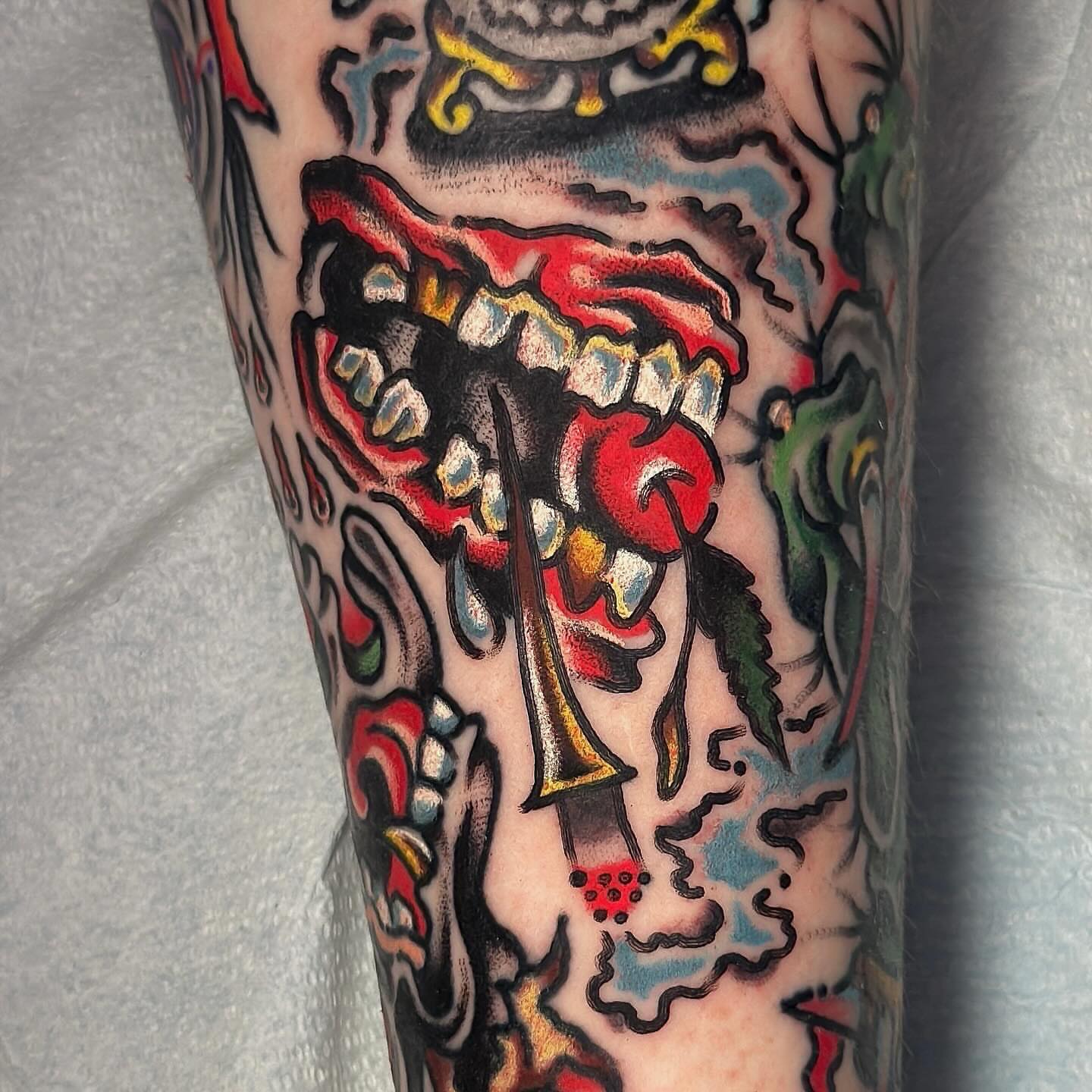 Skull and crossbones American traditional tattoo on the forearm by Jared Allen, Saint Petersburg, Florida