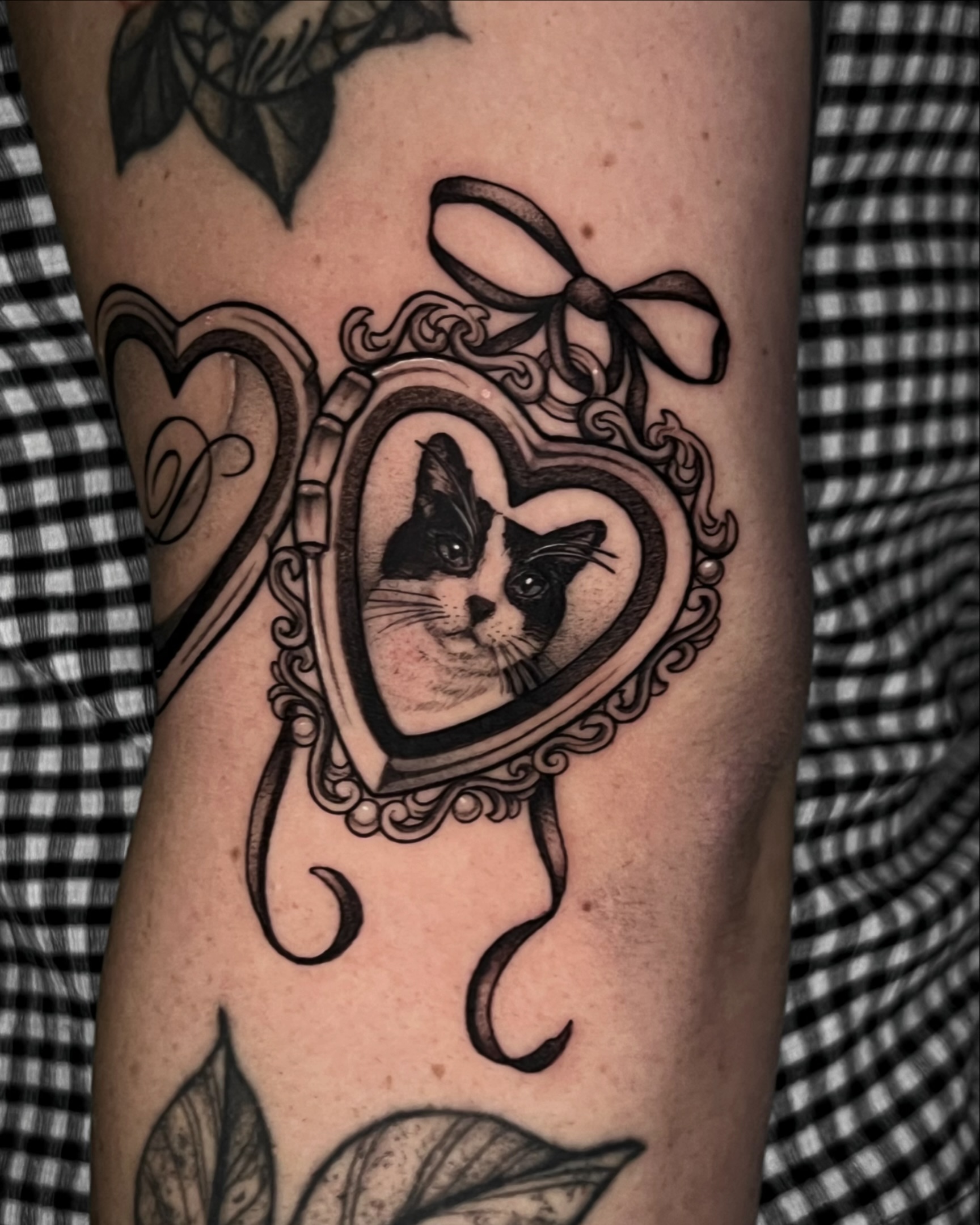 Cat in heart frame realism tattoo on the forearm by ๐ฒ๐ฐ๐ธ๐๐ป๐๐ฝ โก