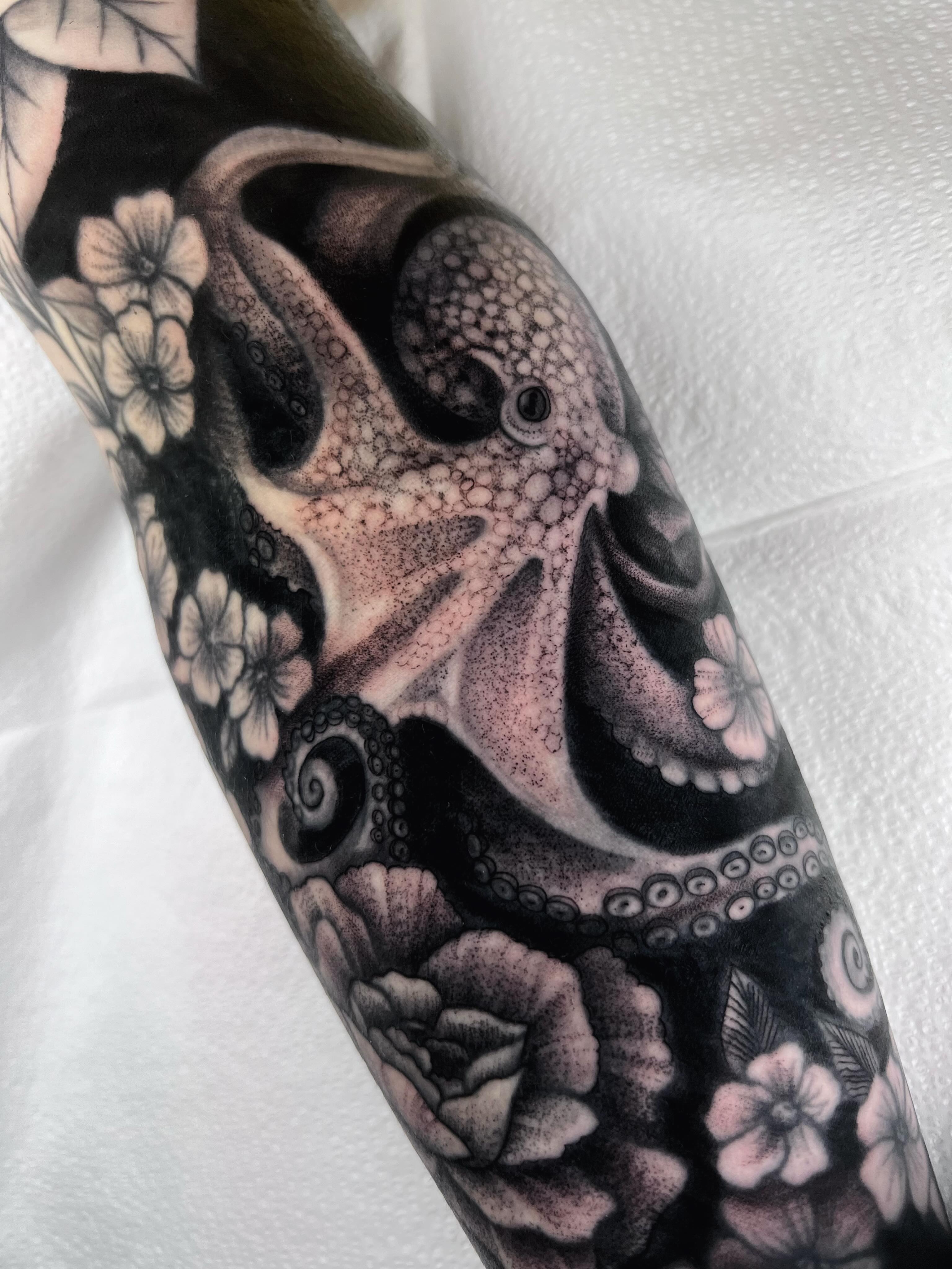 Octopus and flowers dotwork tattoo on the forearm by Anna Wolff, Richmond, Virginia