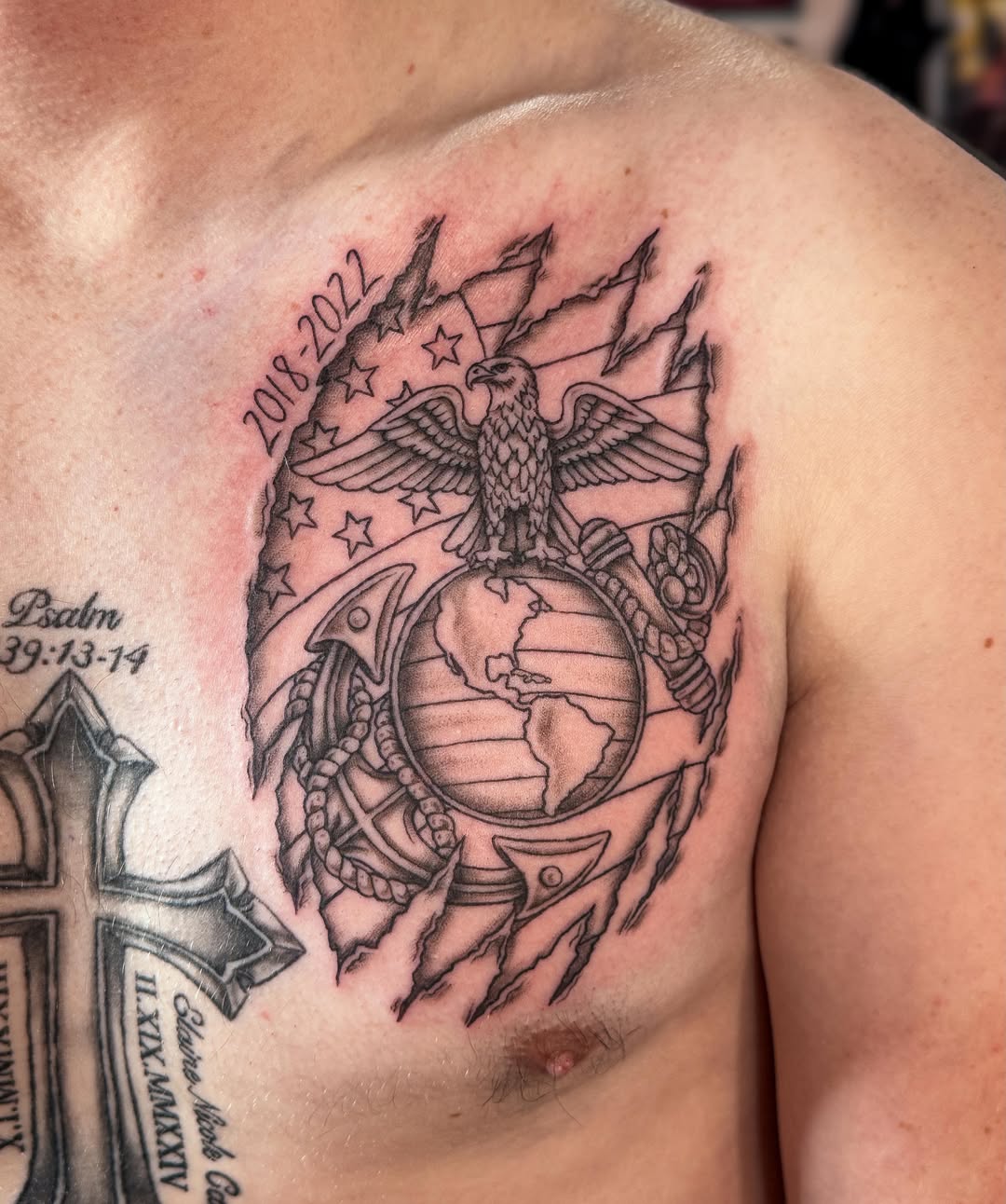 Marine corps emblem black and grey tattoo on the chest by Ash✨