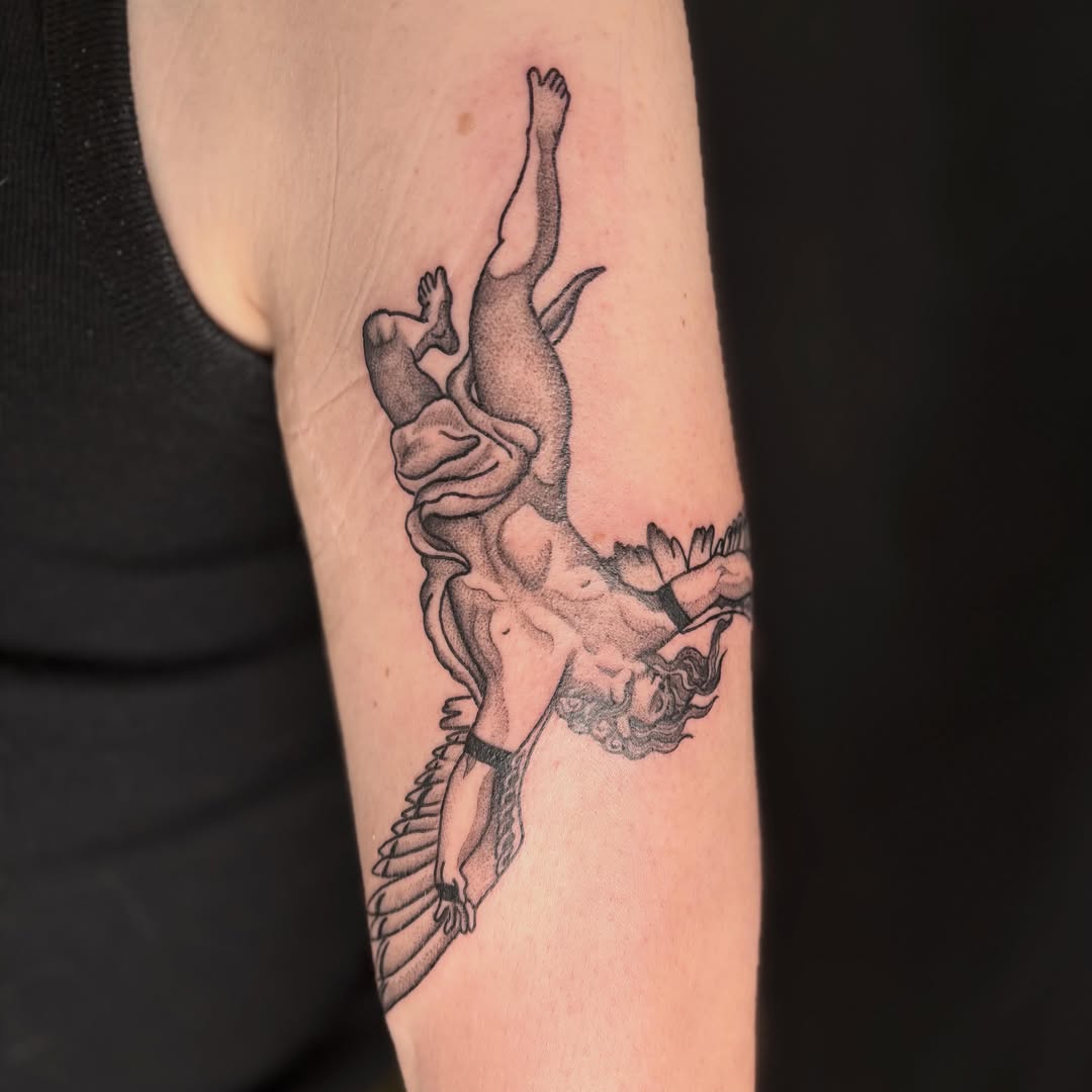 Falling angel dotwork tattoo on the forearm by Erica McCullough