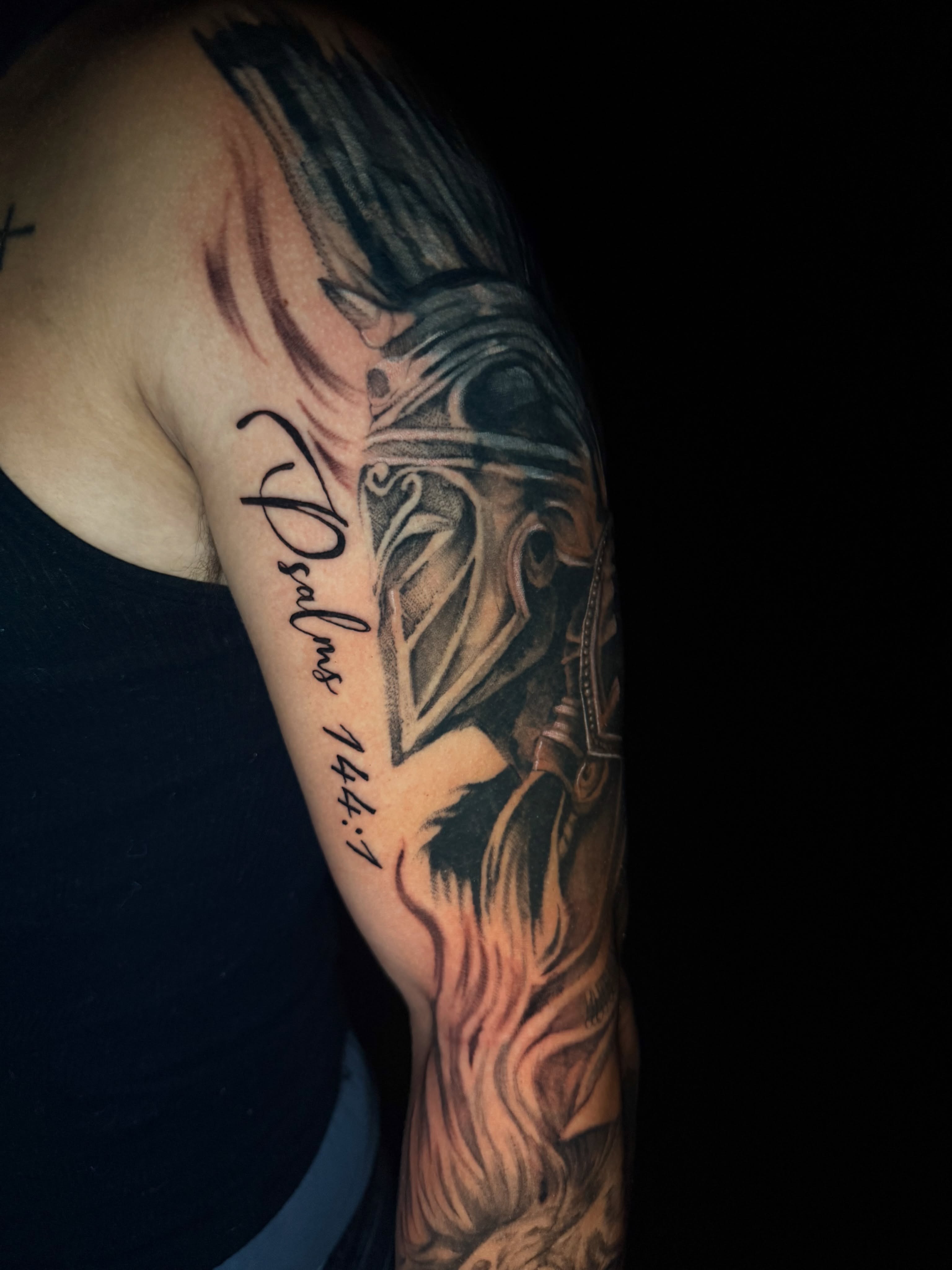 Horse helmet realism tattoo on the shoulder by Exploitedtattoos