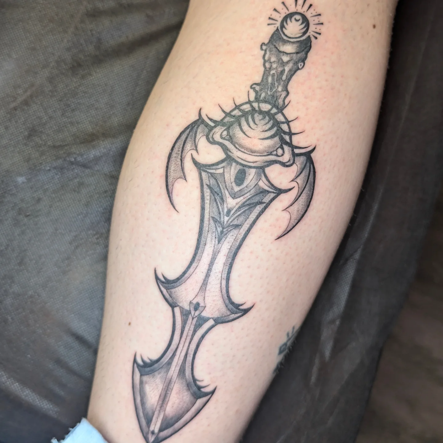 Sword black and grey tattoo on the forearm by Jo Xylo - Minneapolis Tattoo Artist, Minneapolis, Minnesota