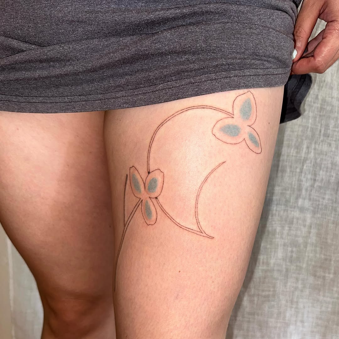 Butterfly fine line tattoo on the thigh by kate