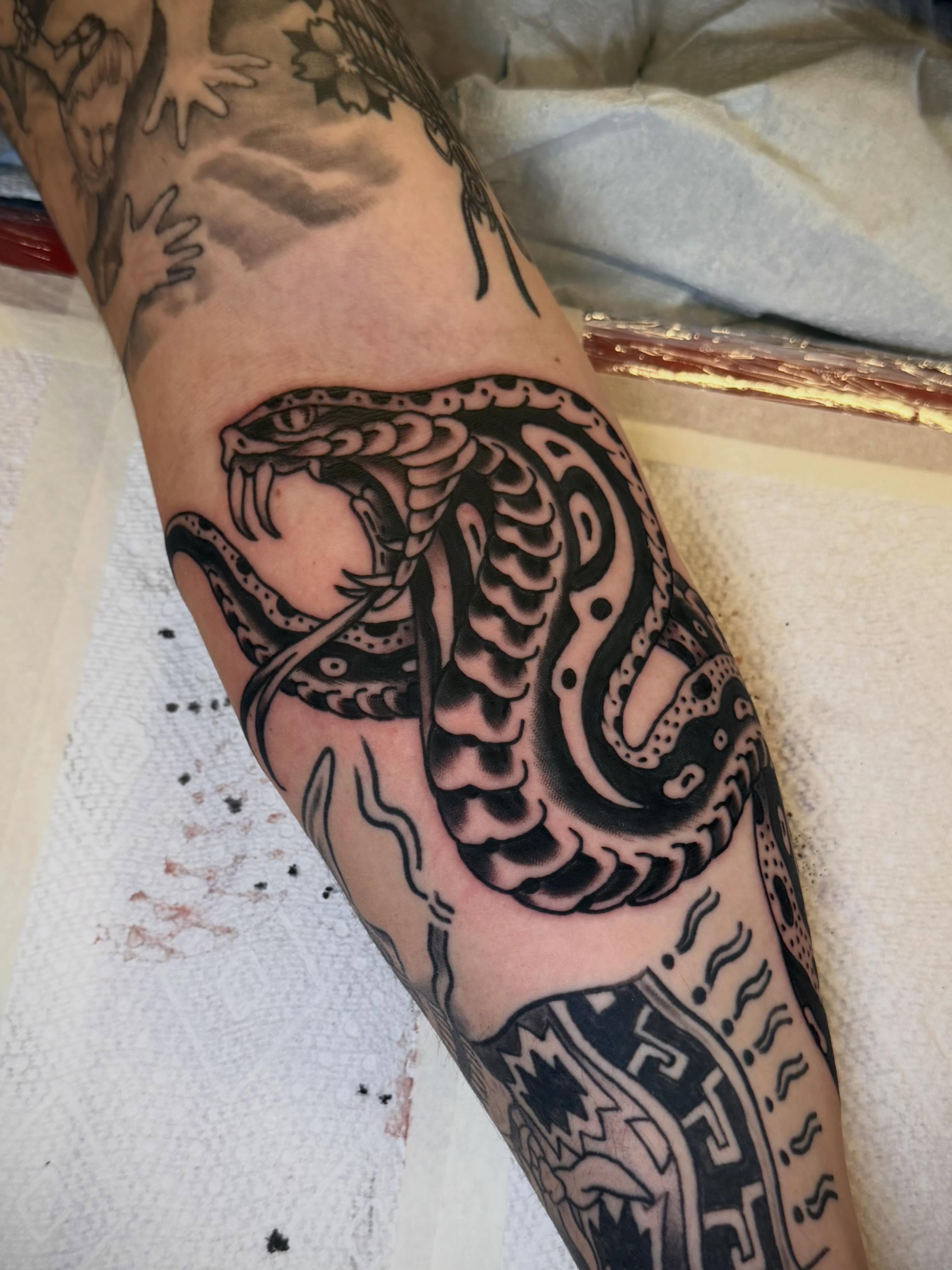 Tattoo by @minnesota_mitch_tattoo — black_and_grey, tribal
