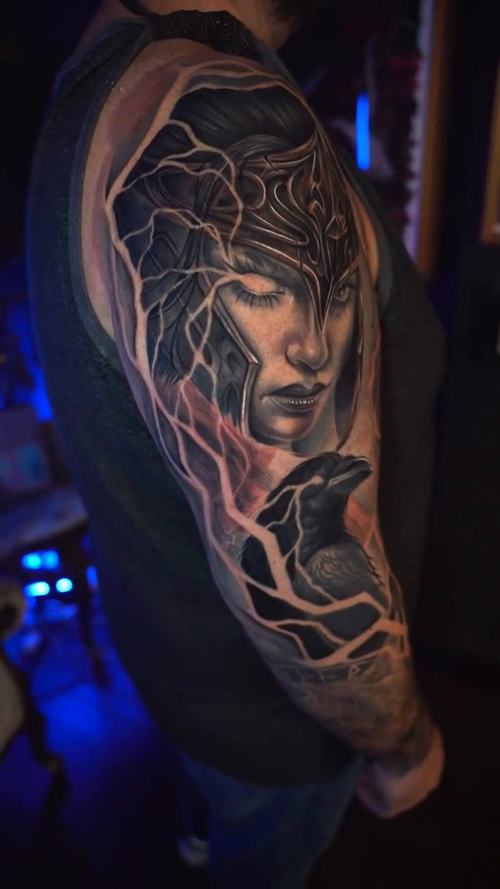 Valkyrie and raven realism tattoo by Cristian Rodriguez