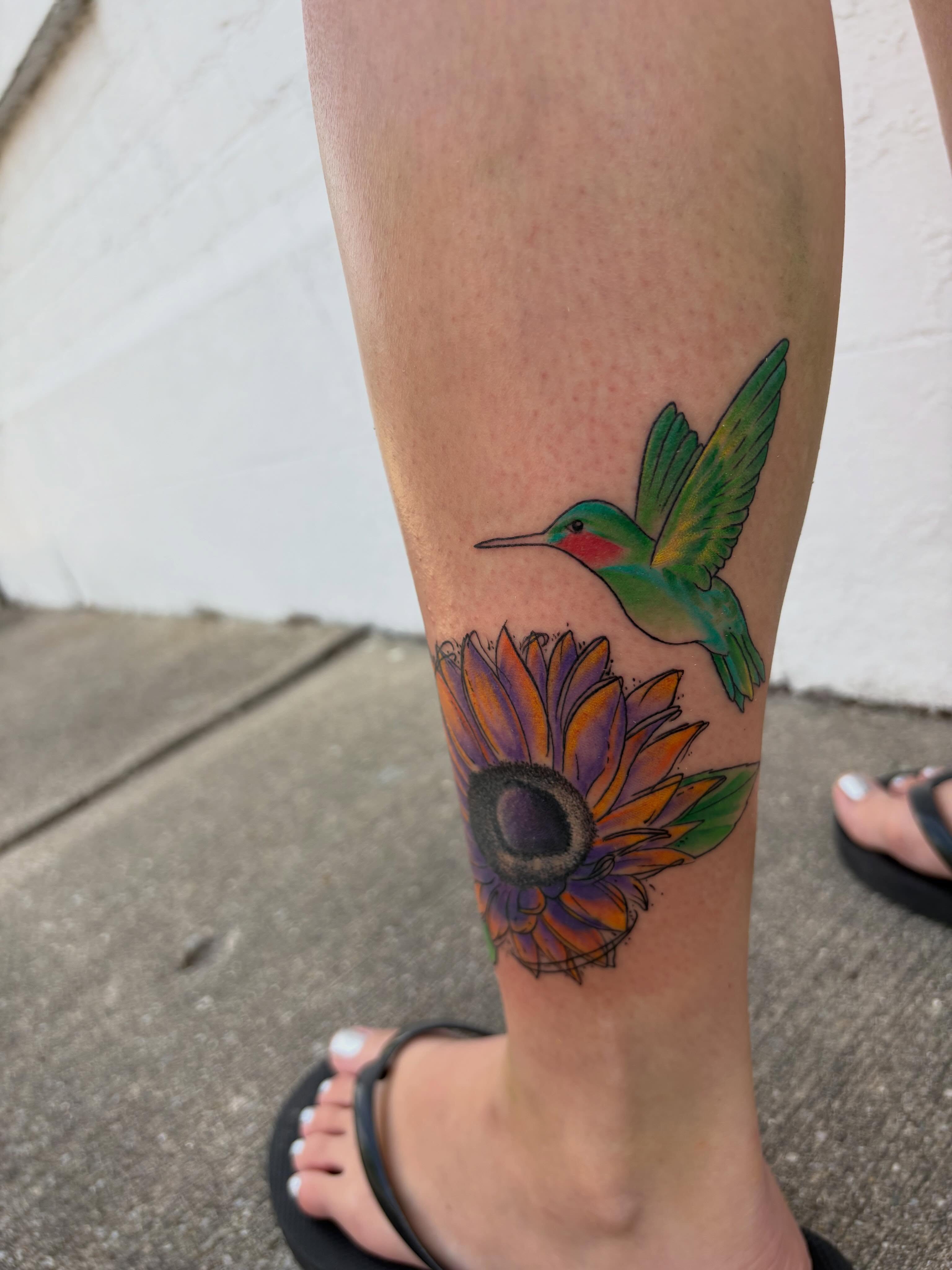 Hummingbird and sunflower realism tattoo on the calf by Andrea 🎨🖌