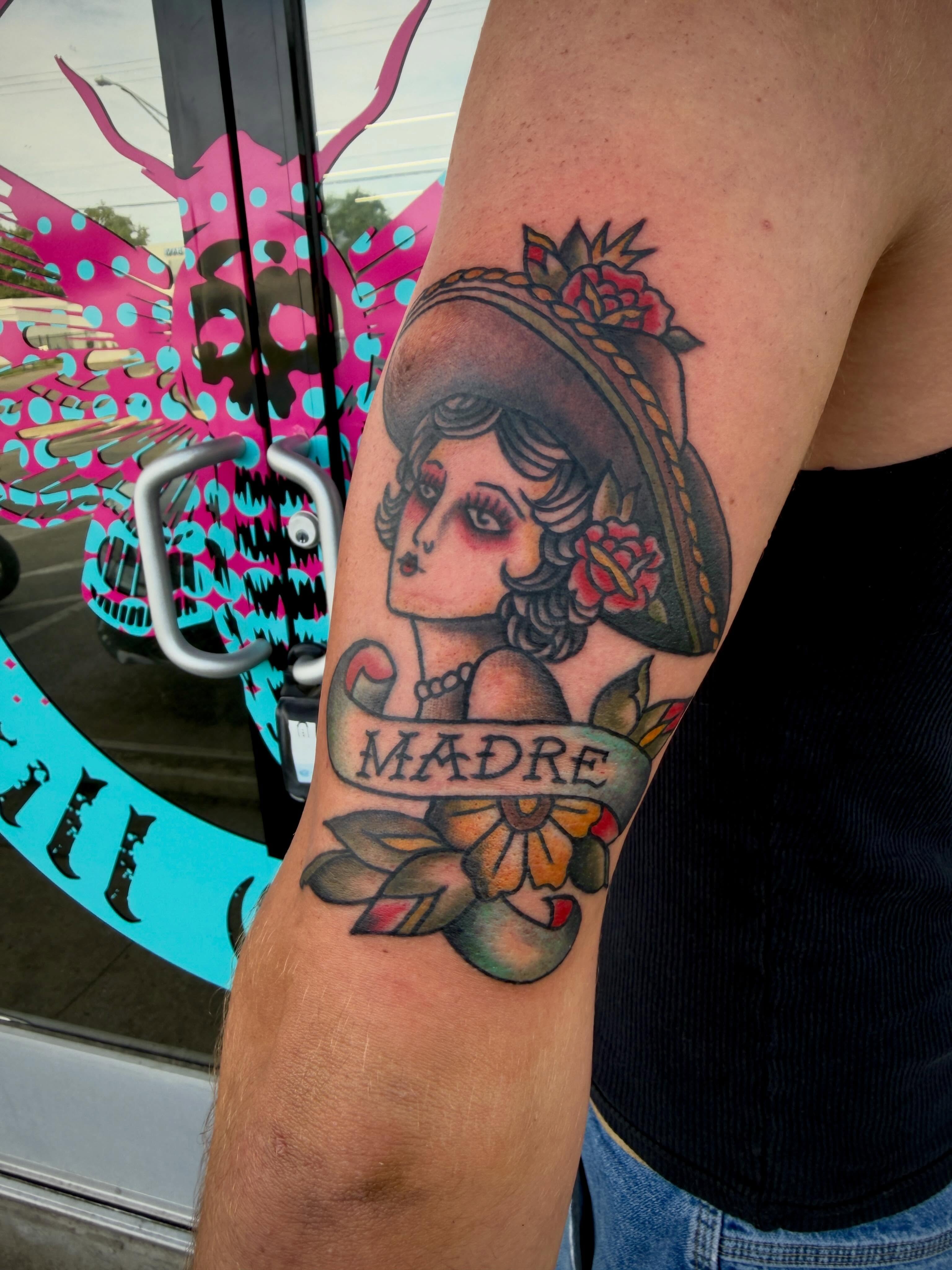 Woman wearing sombrero American traditional tattoo on the forearm by Ali Calis