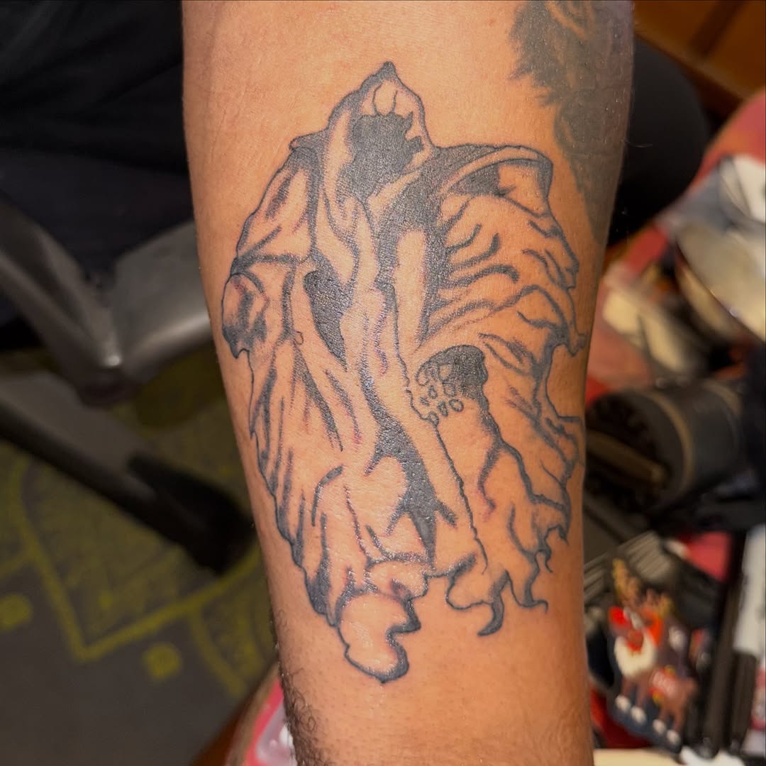 Grim reaper dark art tattoo on the forearm by Addison Bruce