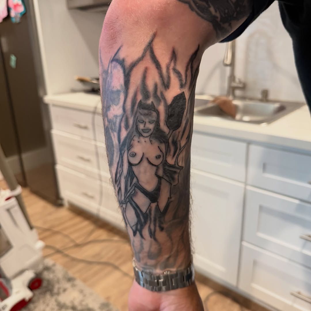 Devil woman with flames realism tattoo on the forearm by Addison Bruce