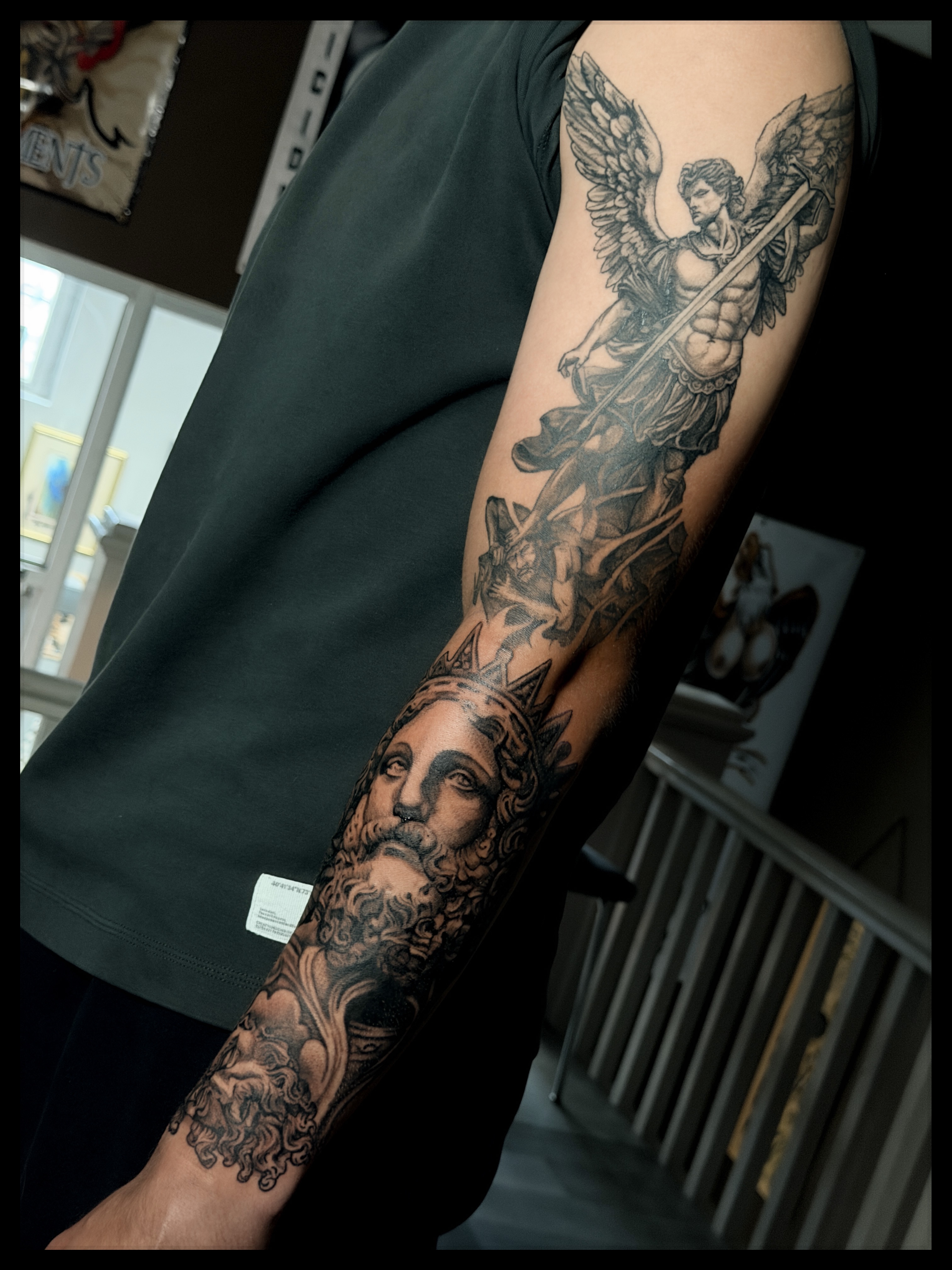Mythological figure realism tattoo on the forearm by Noah Morris