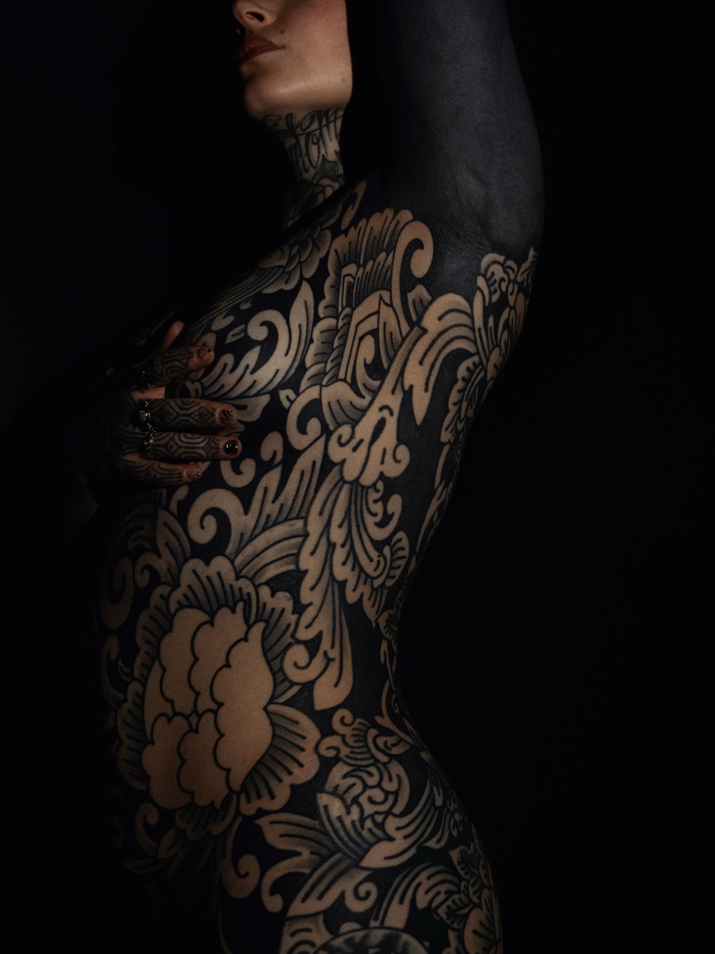 Floral pattern American traditional tattoo on the torso by Kolbi Alexis