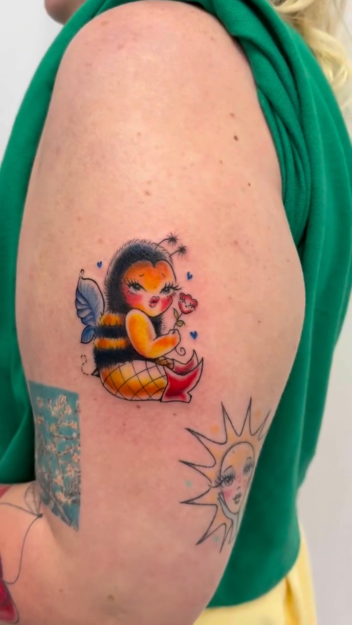 Neo-traditional tattoo on the shoulder by tattooz by megz