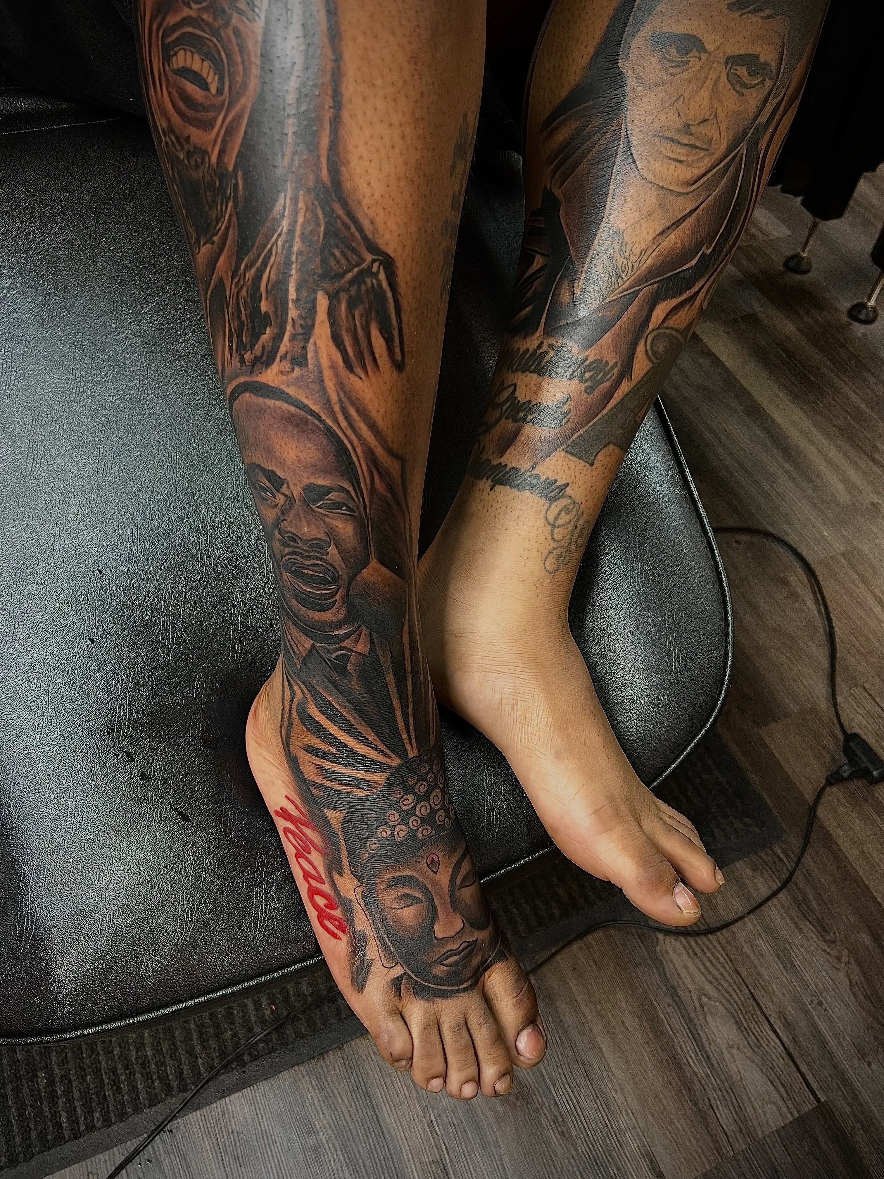 Portraits black and grey tattoo on the leg by Deonte Dwayne Durham