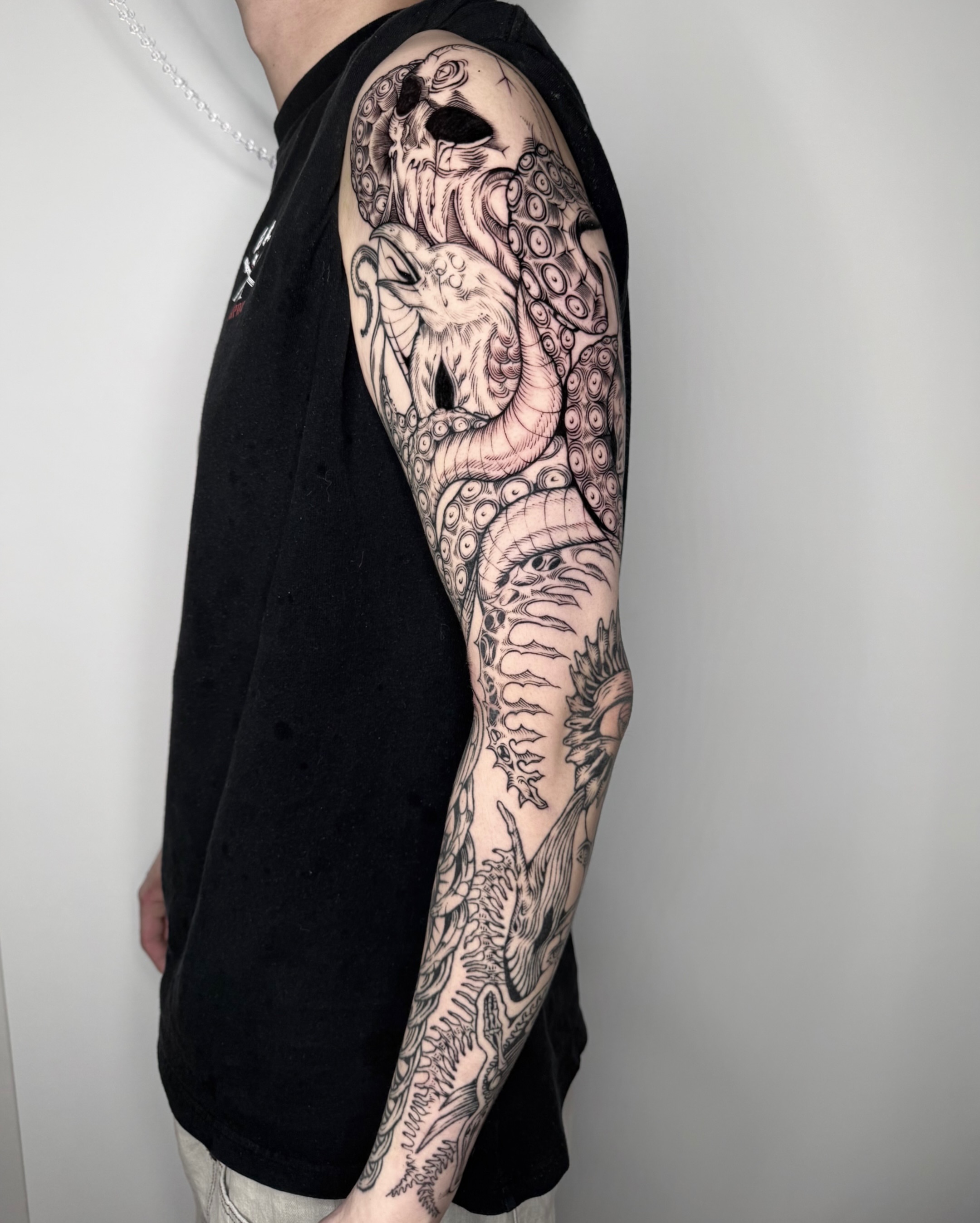 Tattoo by @mimo_tattooist__ — black_and_grey, dark_realism