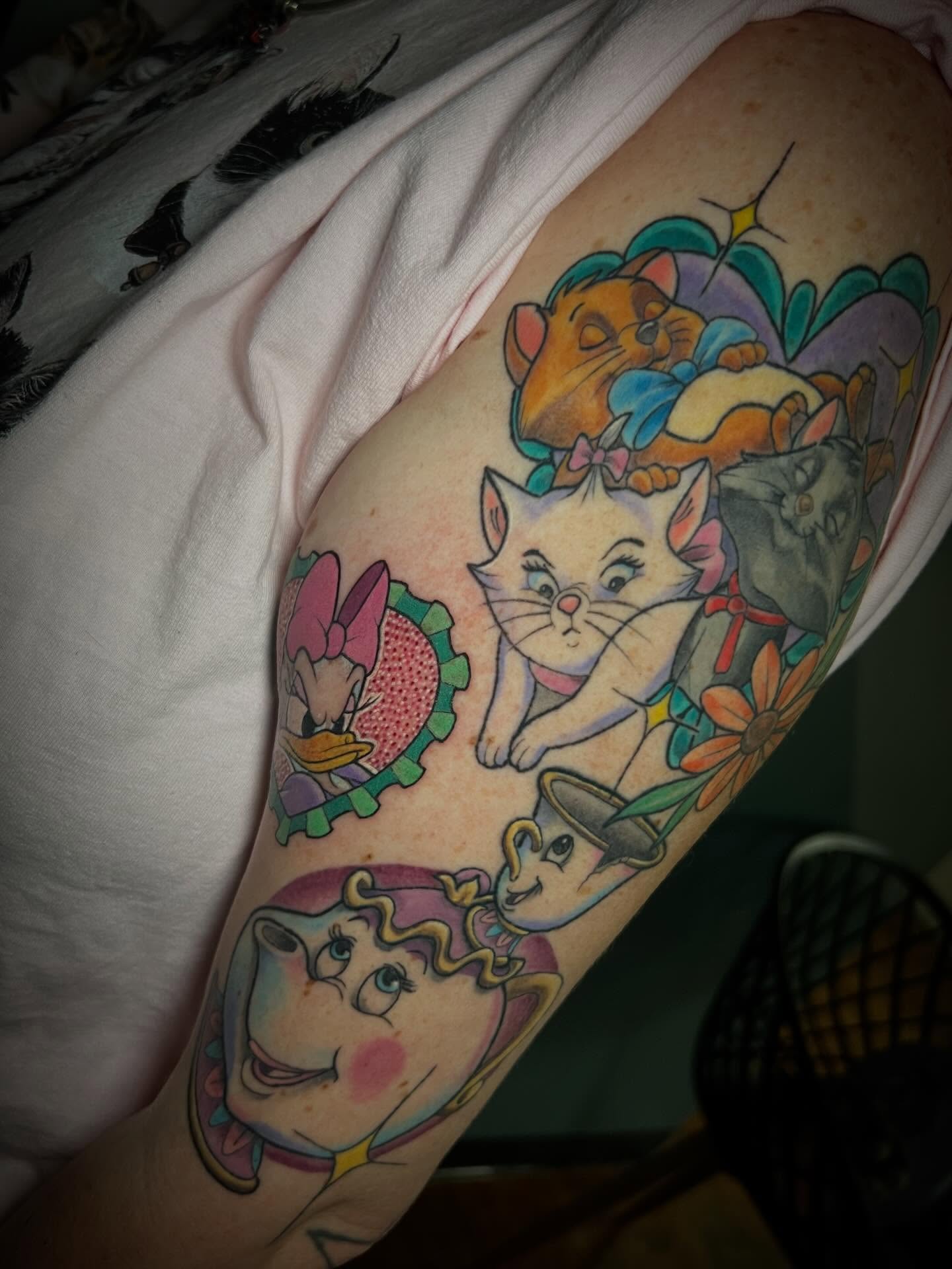Cartoon characters American traditional tattoo on the forearm by Katie Ann Tattoos