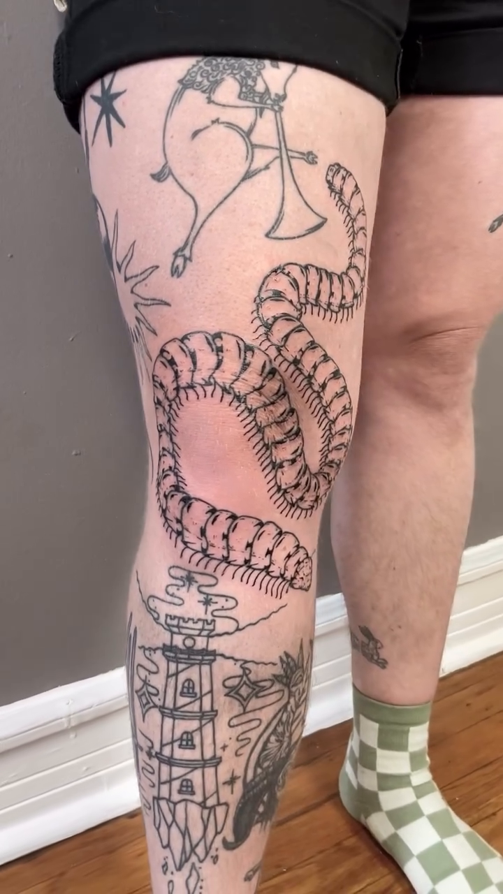 Snake and skeleton on leg ignorant tattoo on the leg by Patricio