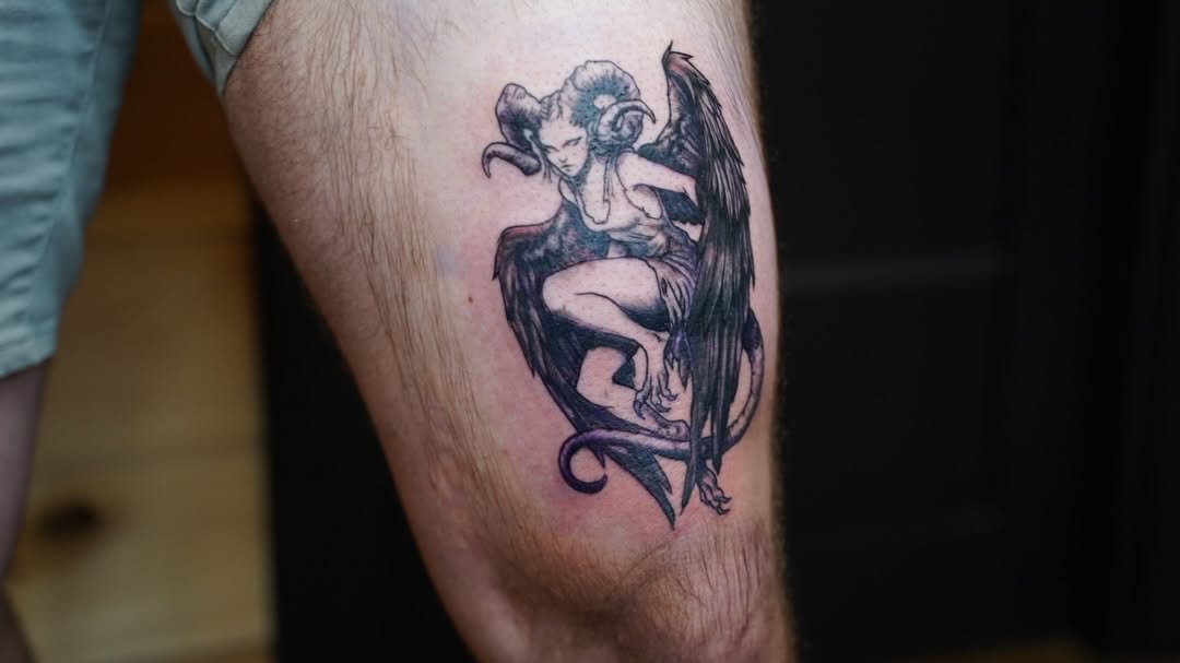 Winged demoness with ram horns realism tattoo on the thigh by ★𝐑𝐮𝐞★