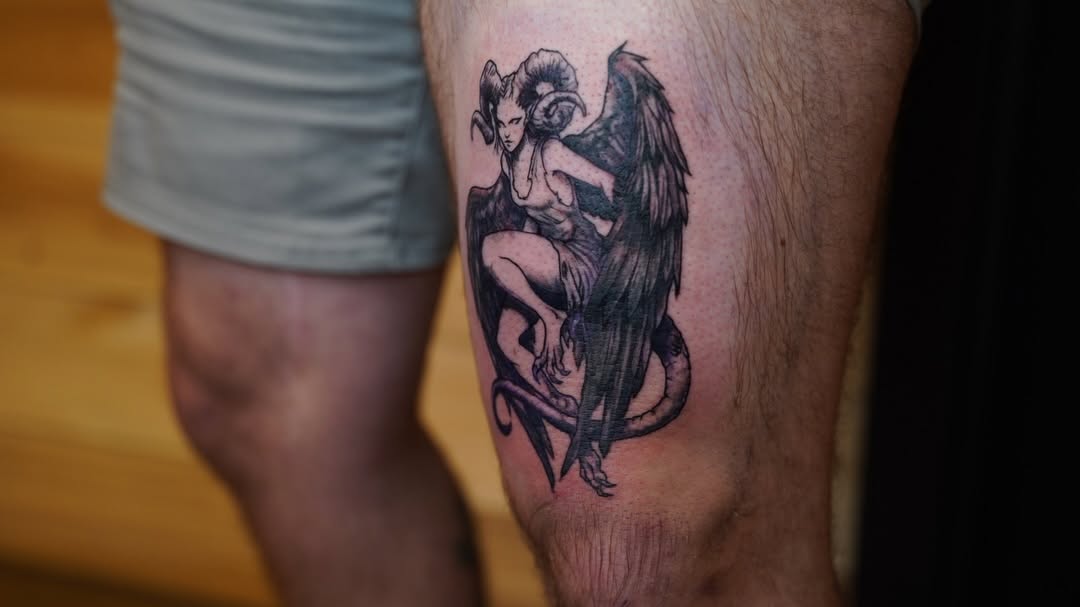 Demon woman with wings realism tattoo on the thigh by ★𝐑𝐮𝐞★