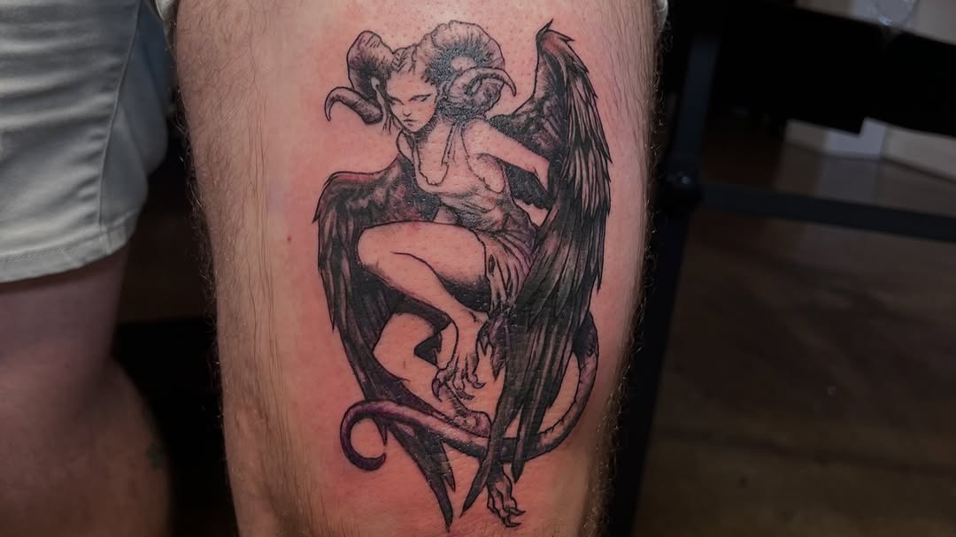 Demon woman with wings and horns realism tattoo on the thigh by ★𝐑𝐮𝐞★