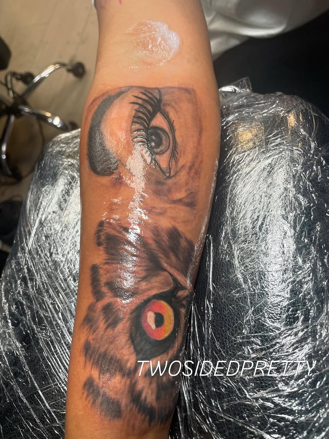 Owl eye tattoo on the forearm by @twosidedpretty