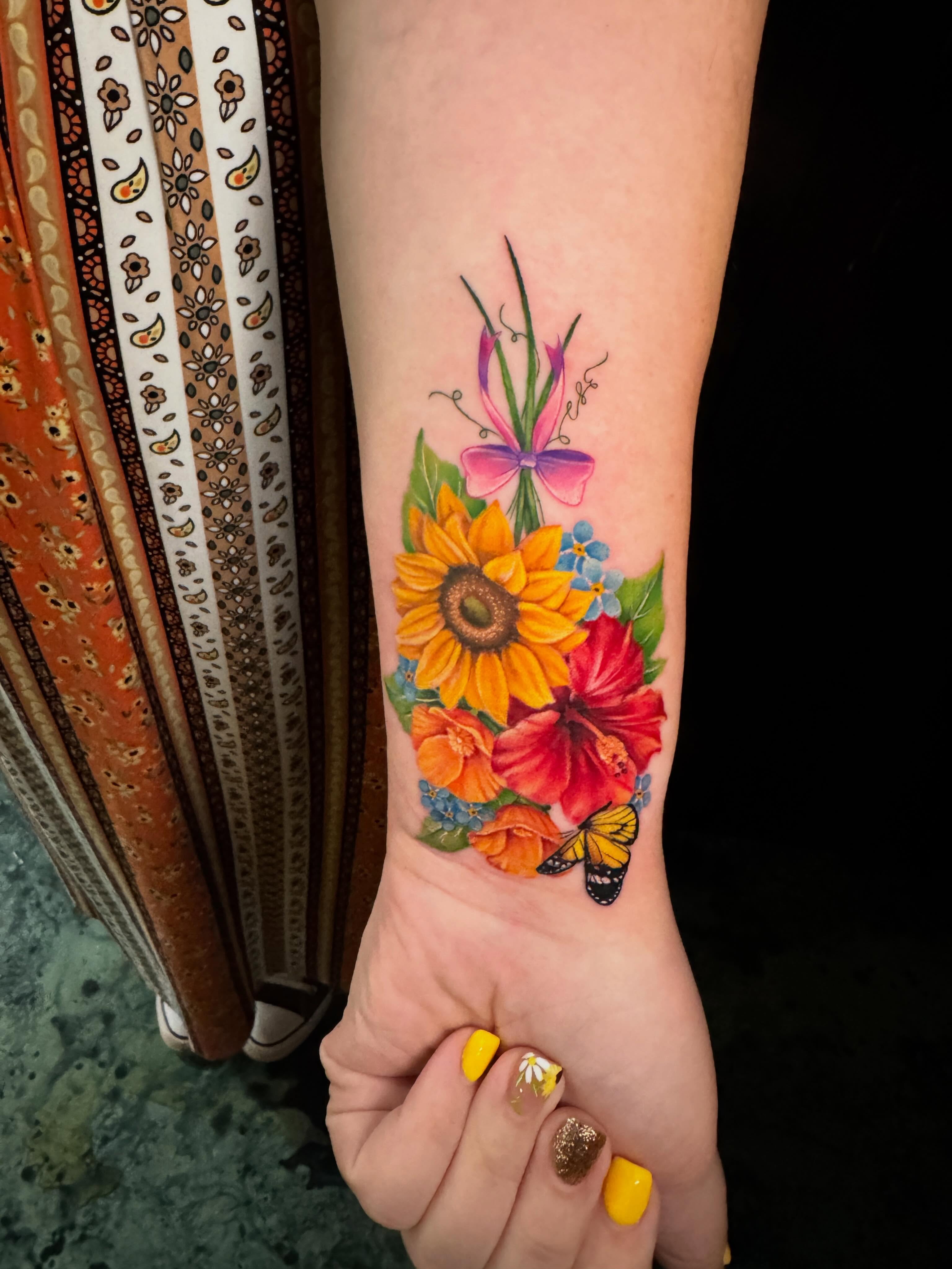 Flowers and butterflies realism tattoo on the forearm by Violet Michelle Williams, Charlotte, North Carolina